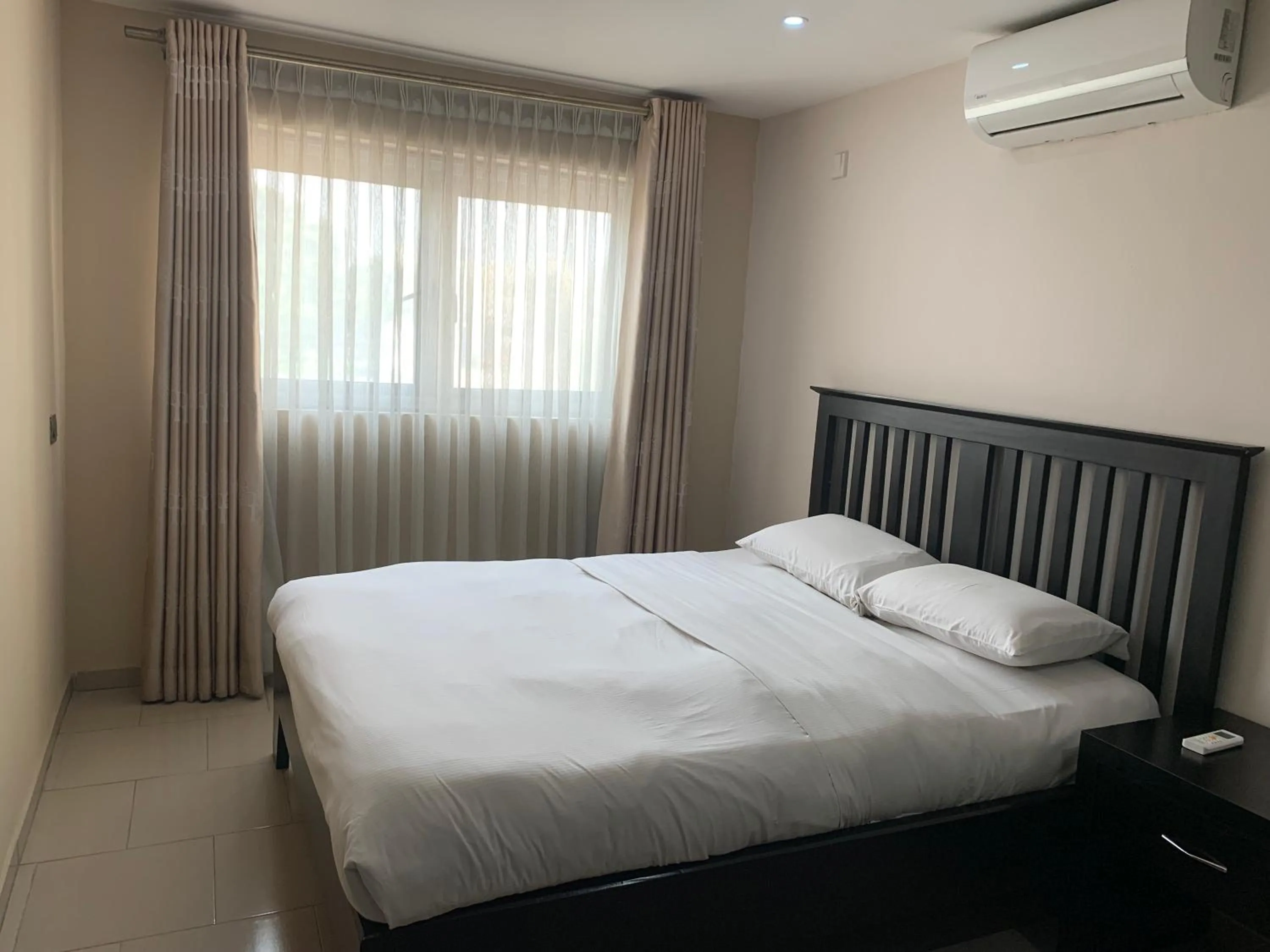 Bed in Emem Court - The Emem Apartment Collections