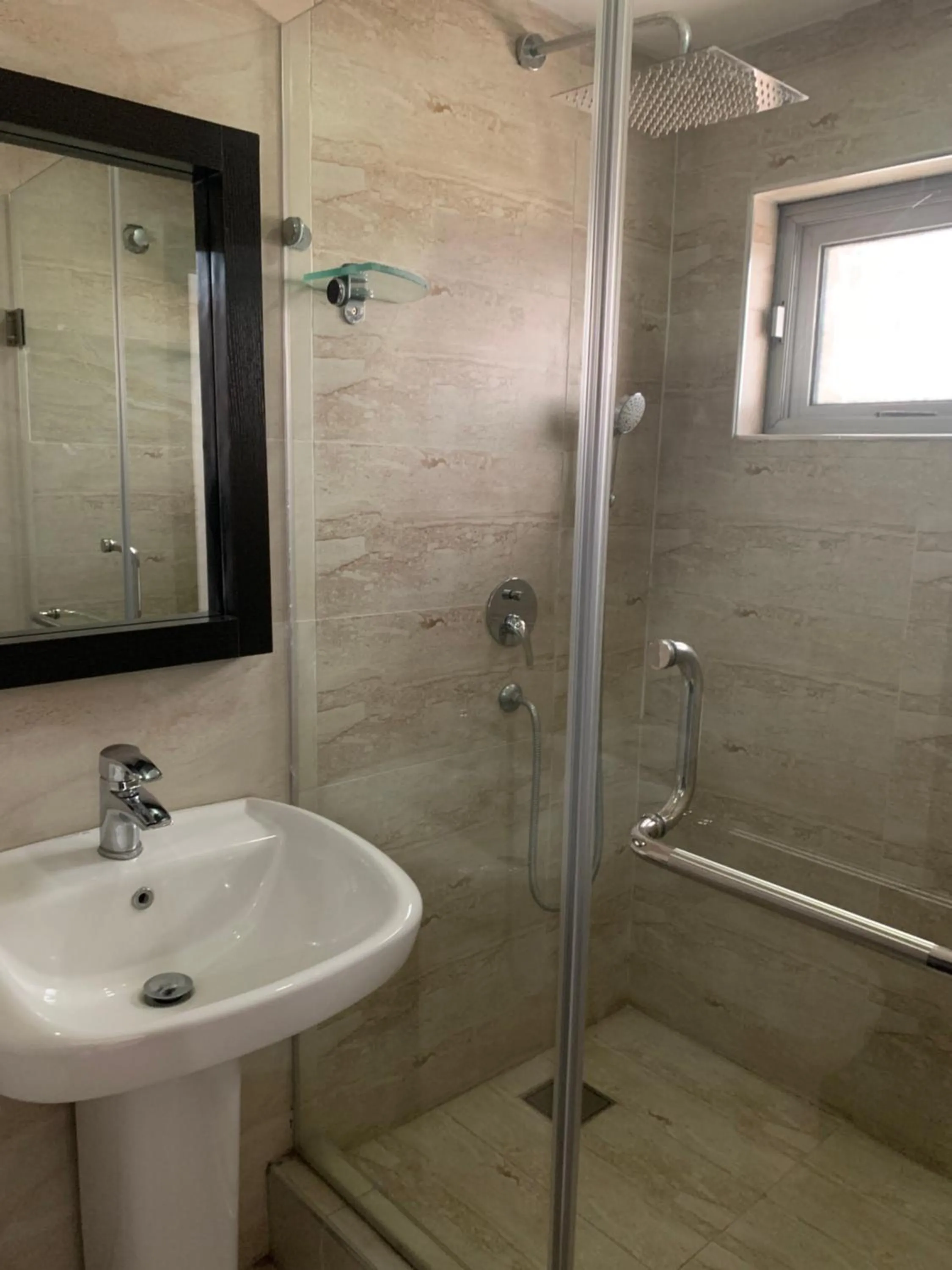 Shower in Emem Court - The Emem Apartment Collections