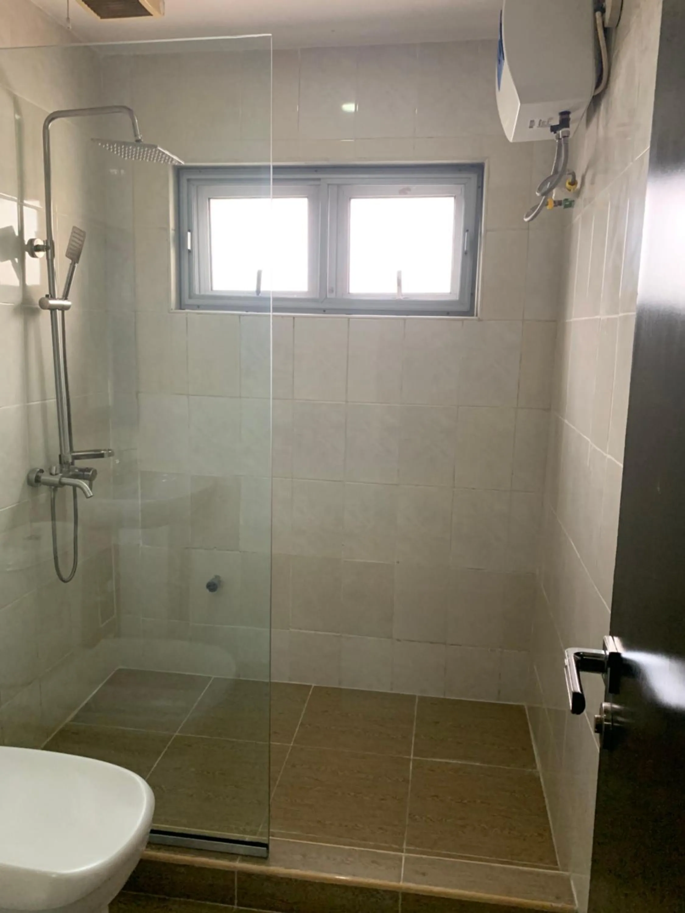Shower in Emem Court - The Emem Apartment Collections