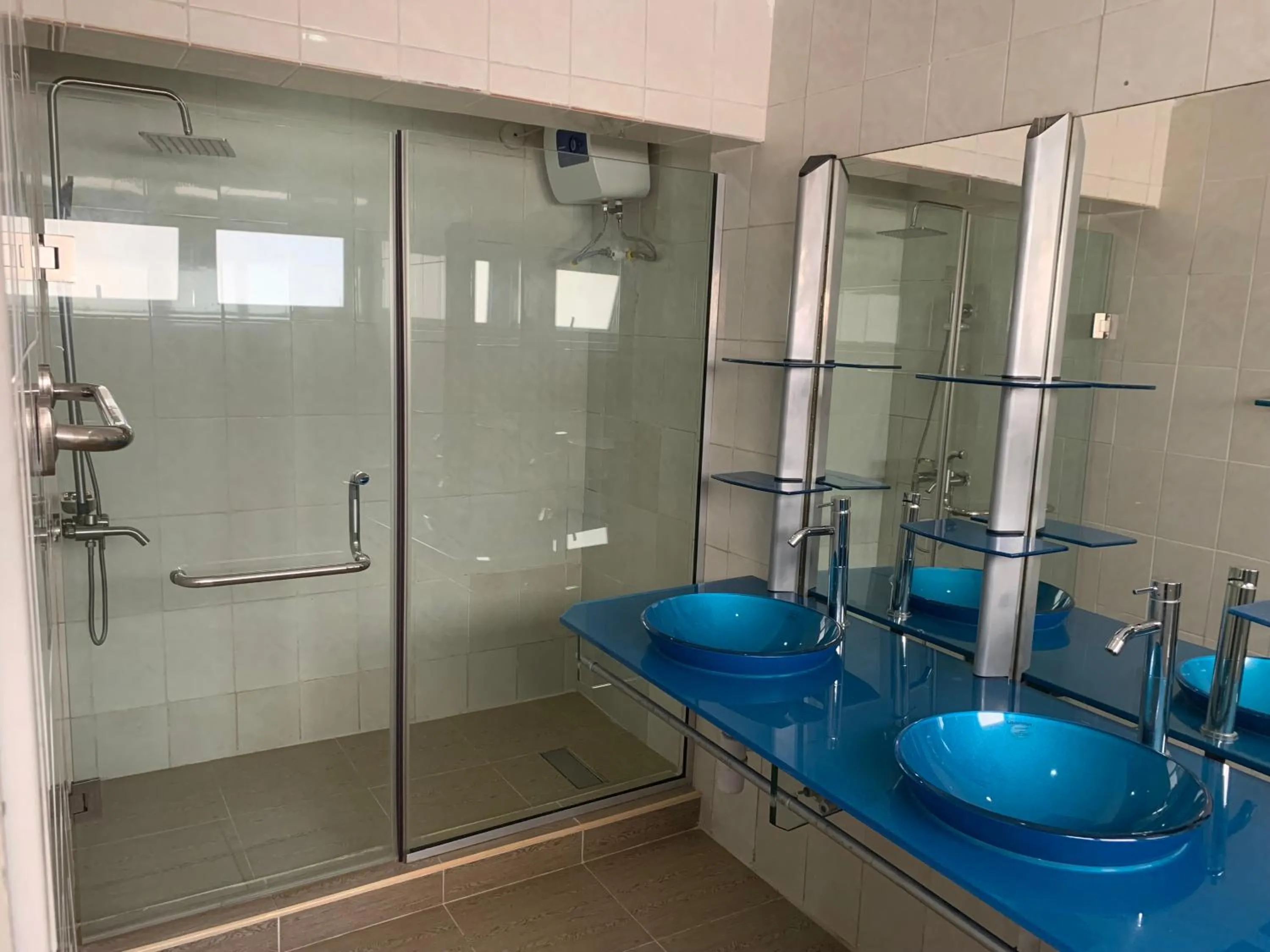 Shower in Emem Court - The Emem Apartment Collections