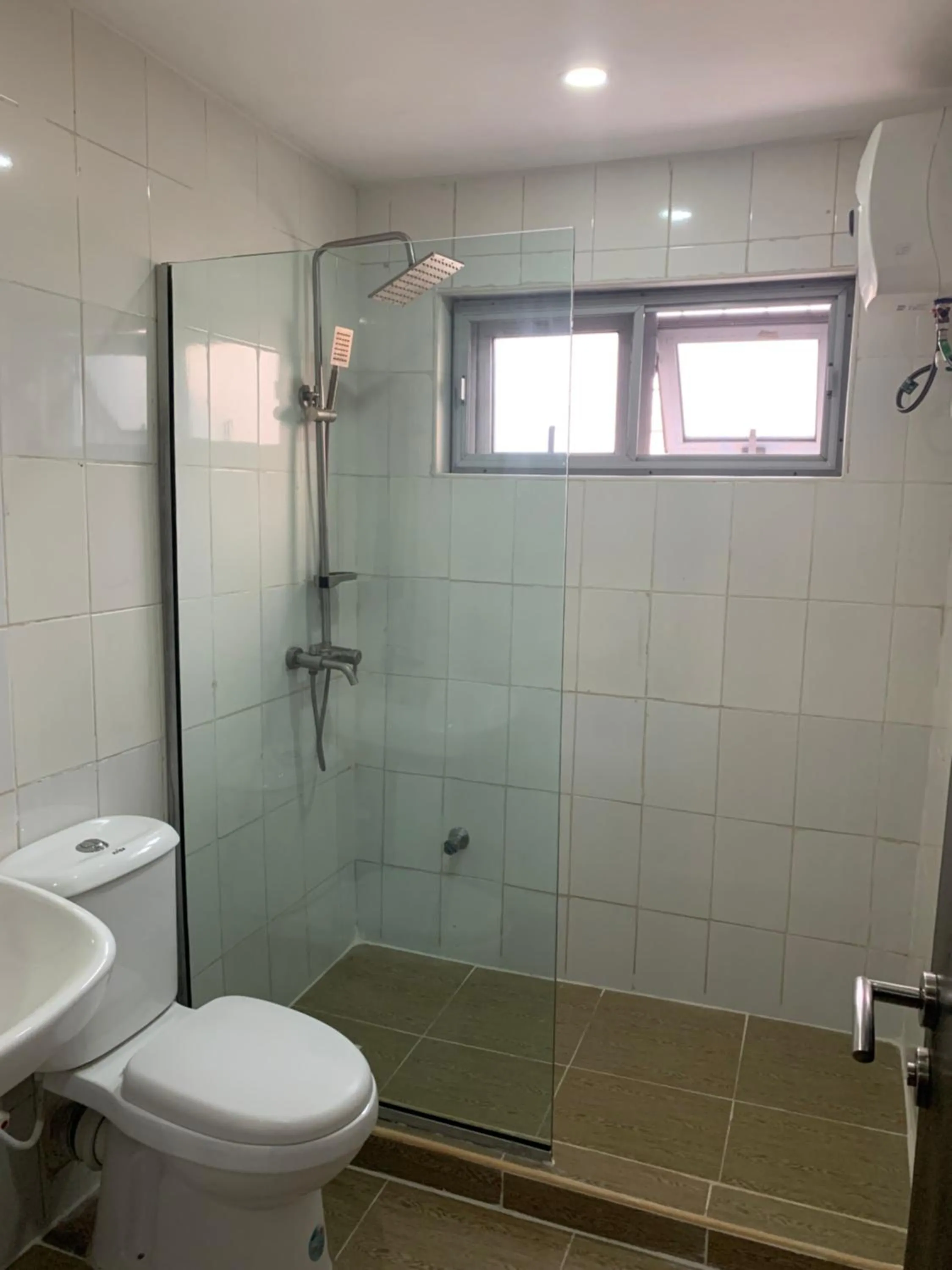Shower in Emem Court - The Emem Apartment Collections