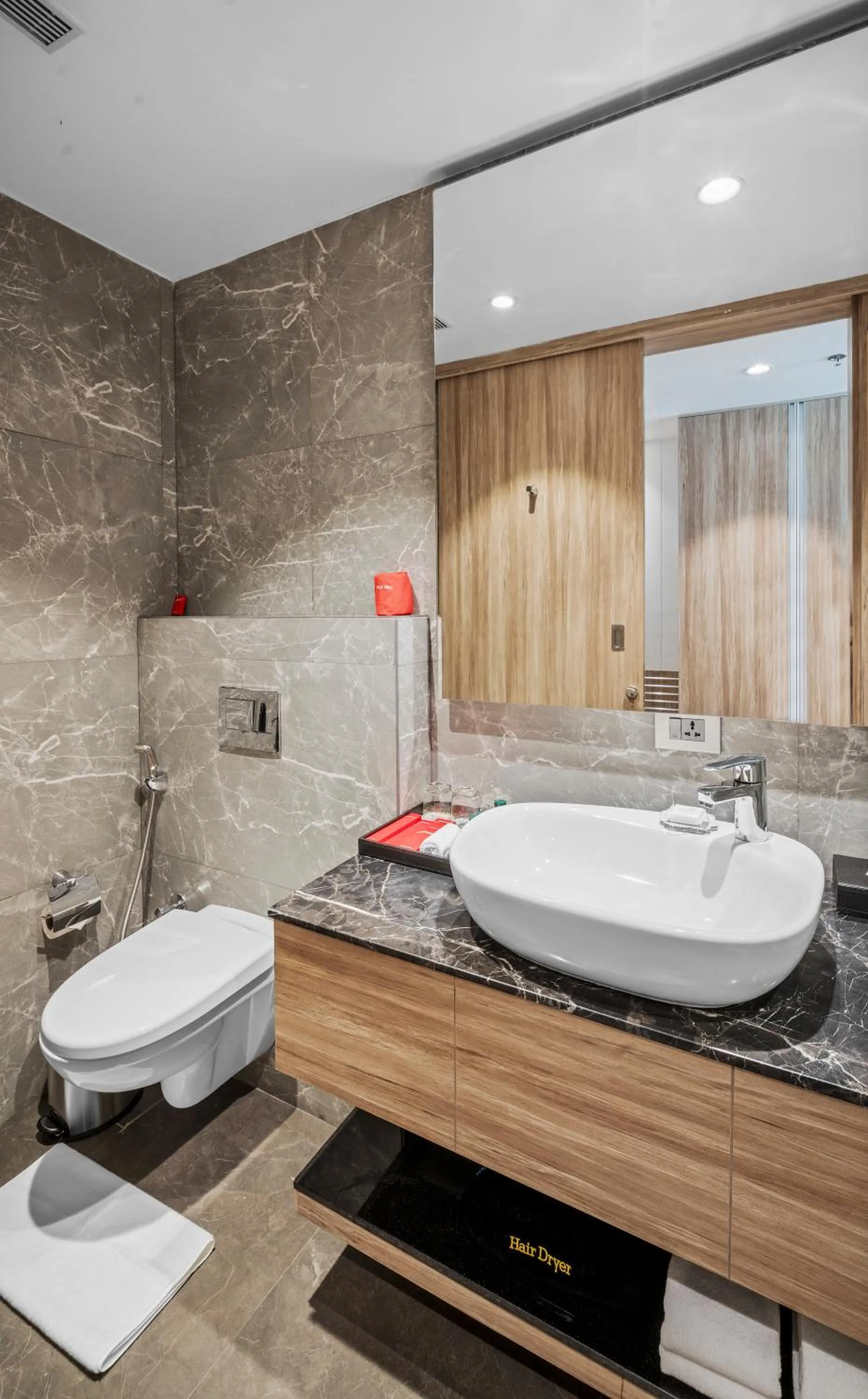 Bathroom in Grand Vijayawada by GRT Hotels