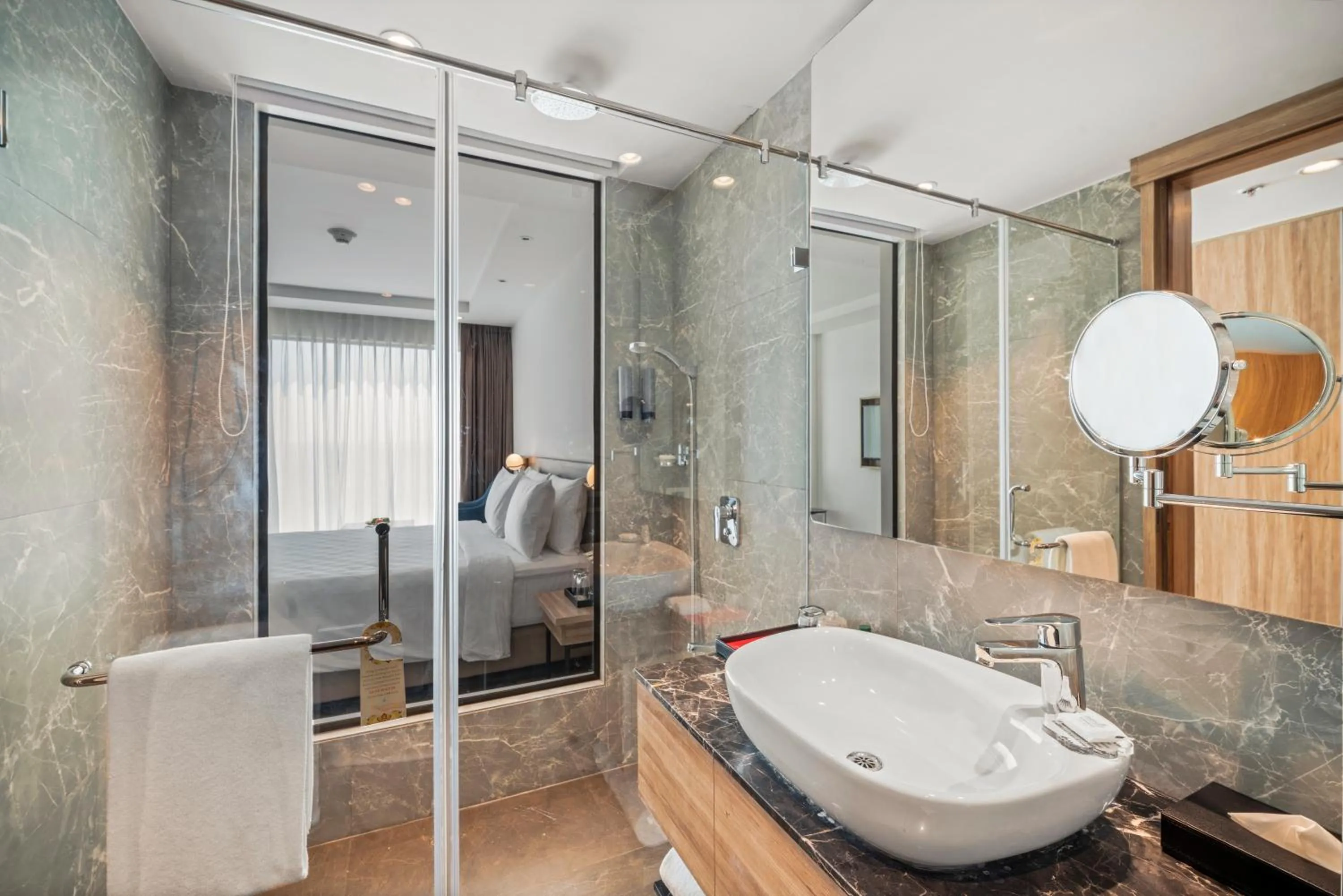 Bathroom in Grand Vijayawada by GRT Hotels