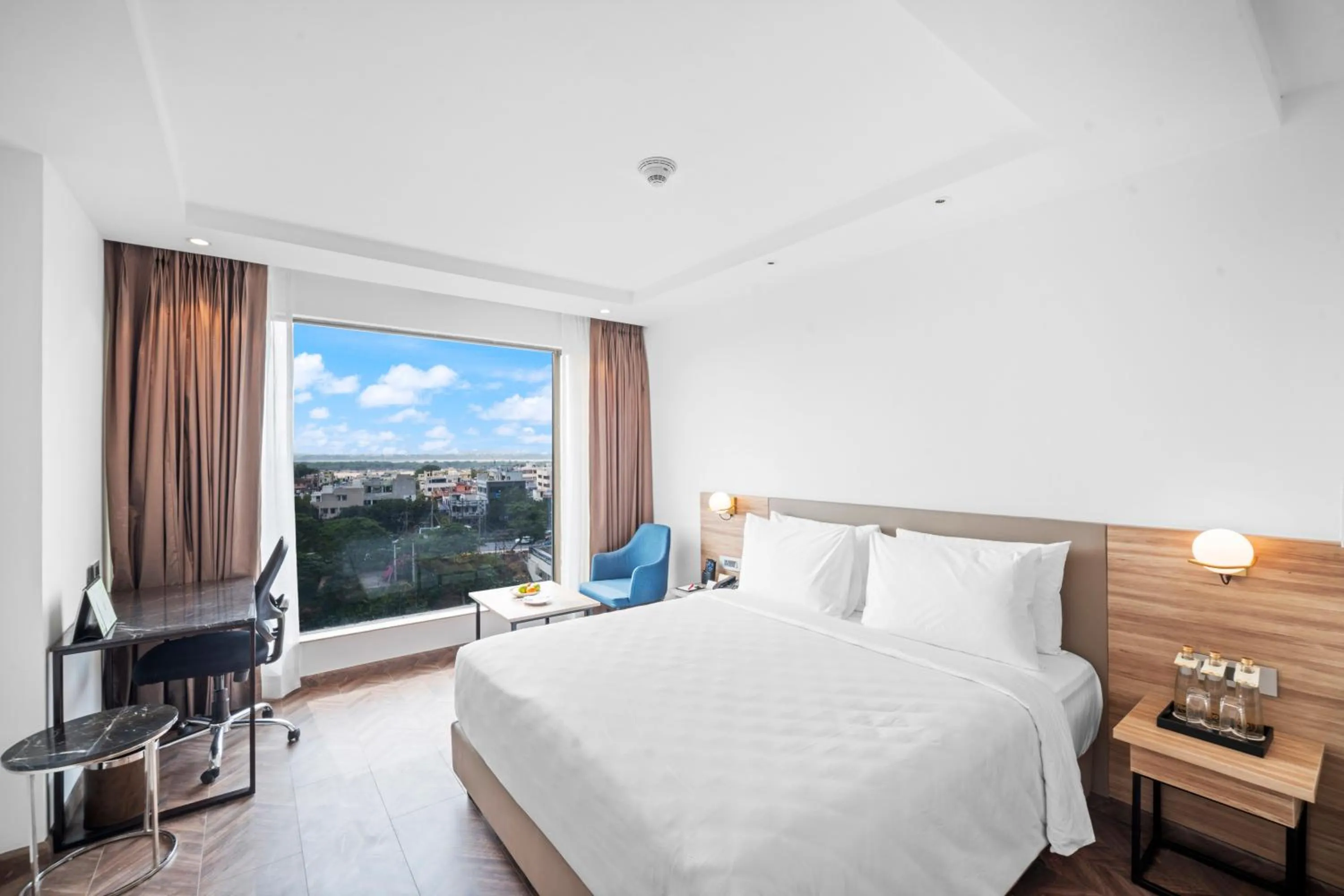 Photo of the whole room, Bed in Grand Vijayawada by GRT Hotels