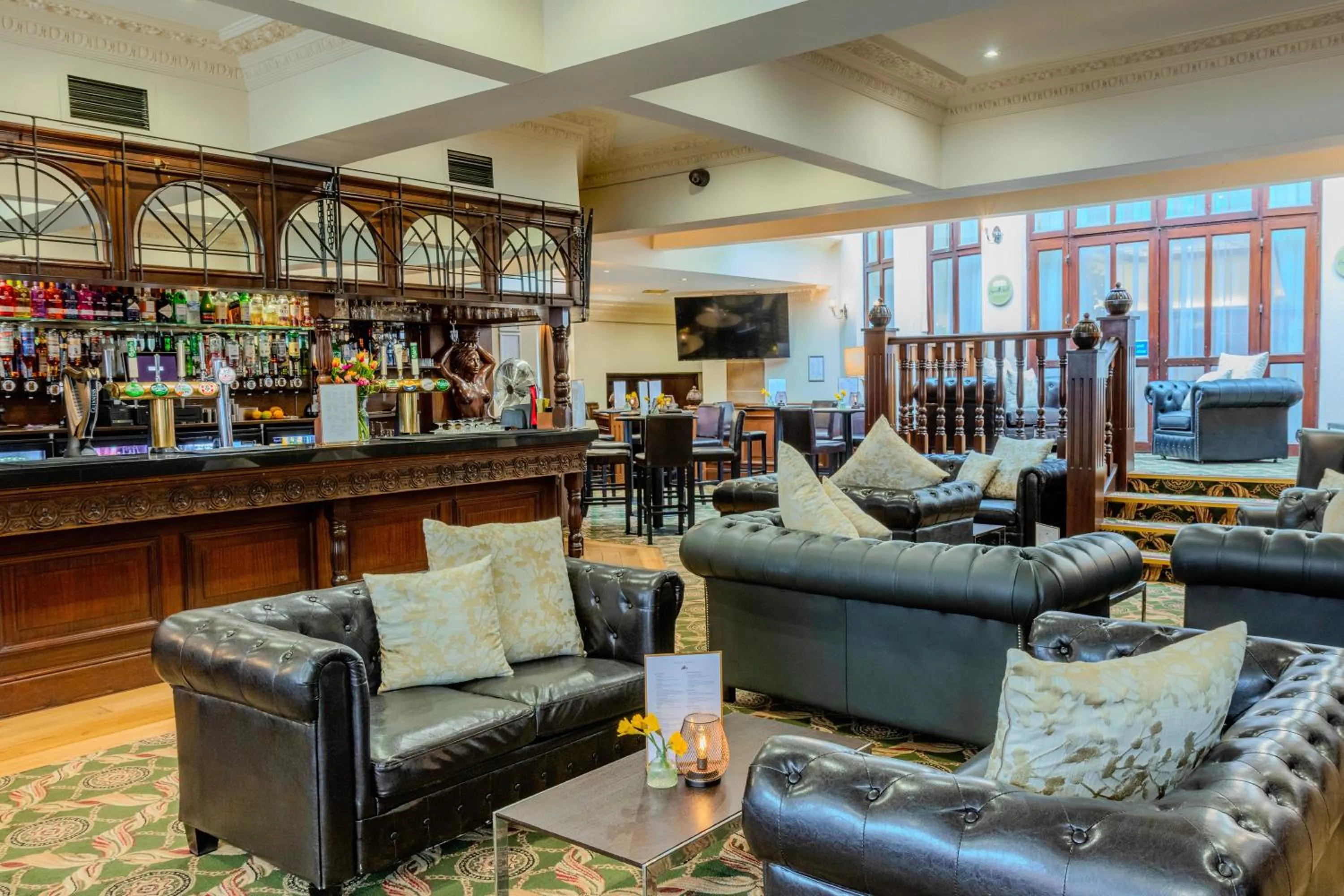 Communal lounge/ TV room in Bosworth Hall Hotel