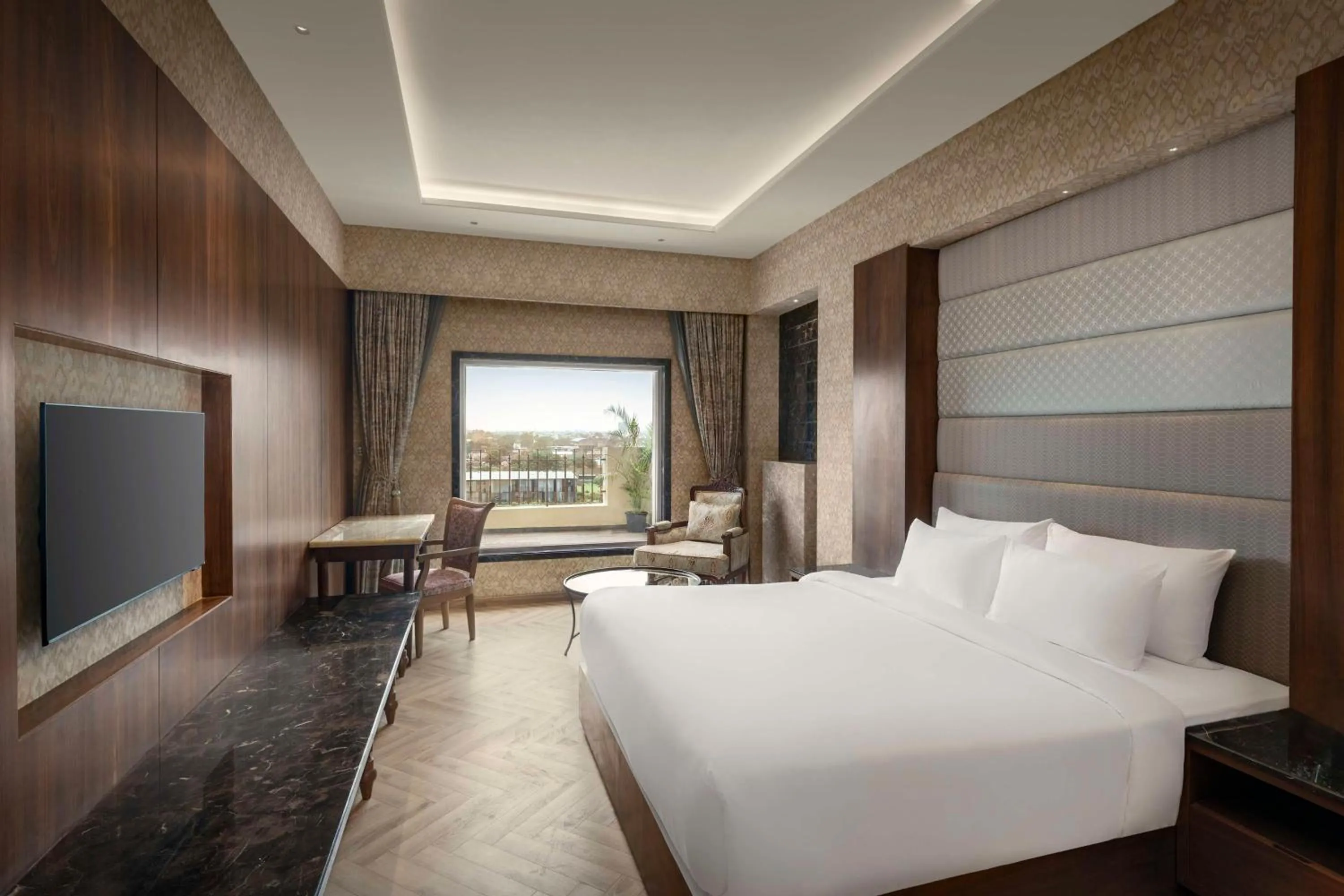 Bed in Jasraj Palace Yavatmal Hotel, a member of Radisson Individuals