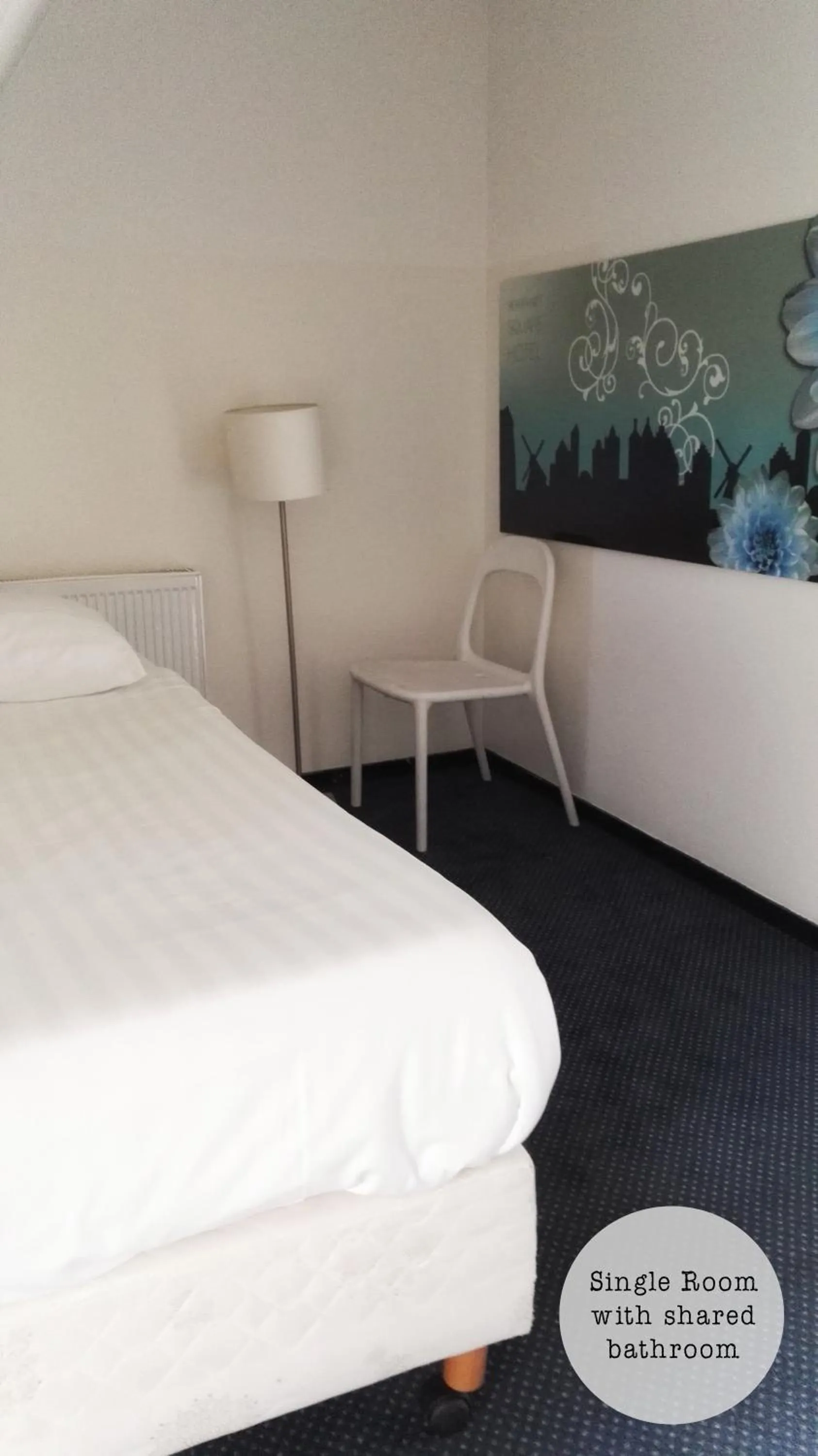 Bed in Rembrandt Square Hotel