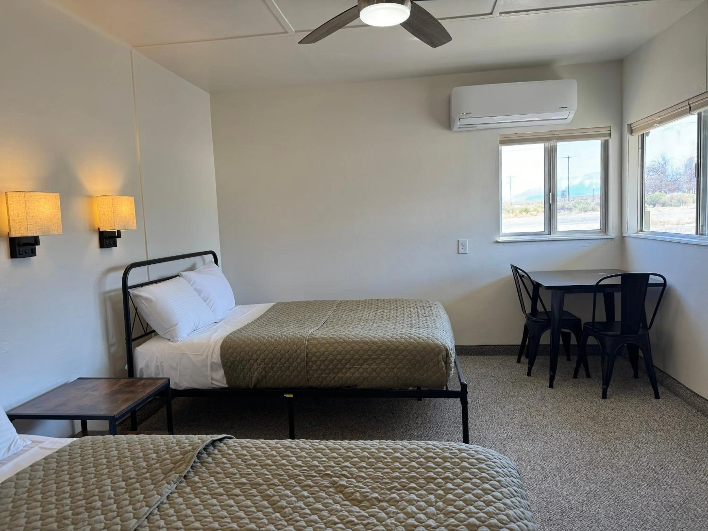 Bed in Eastern Sierra Motor Lodge