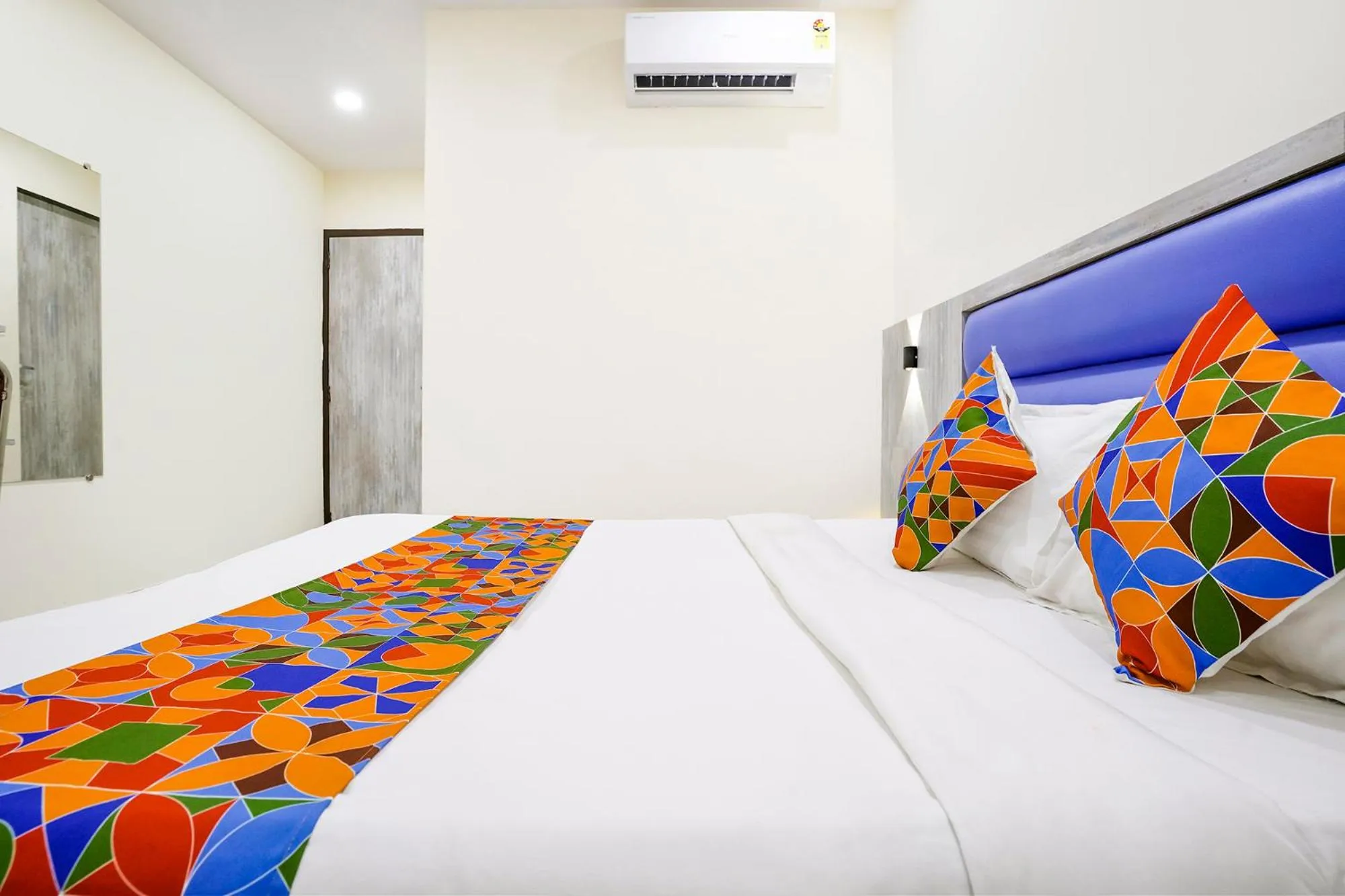 Bed in FabHotel Good Luck Residency