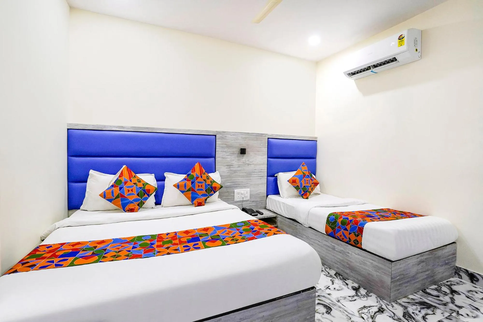 Bed in FabHotel Good Luck Residency