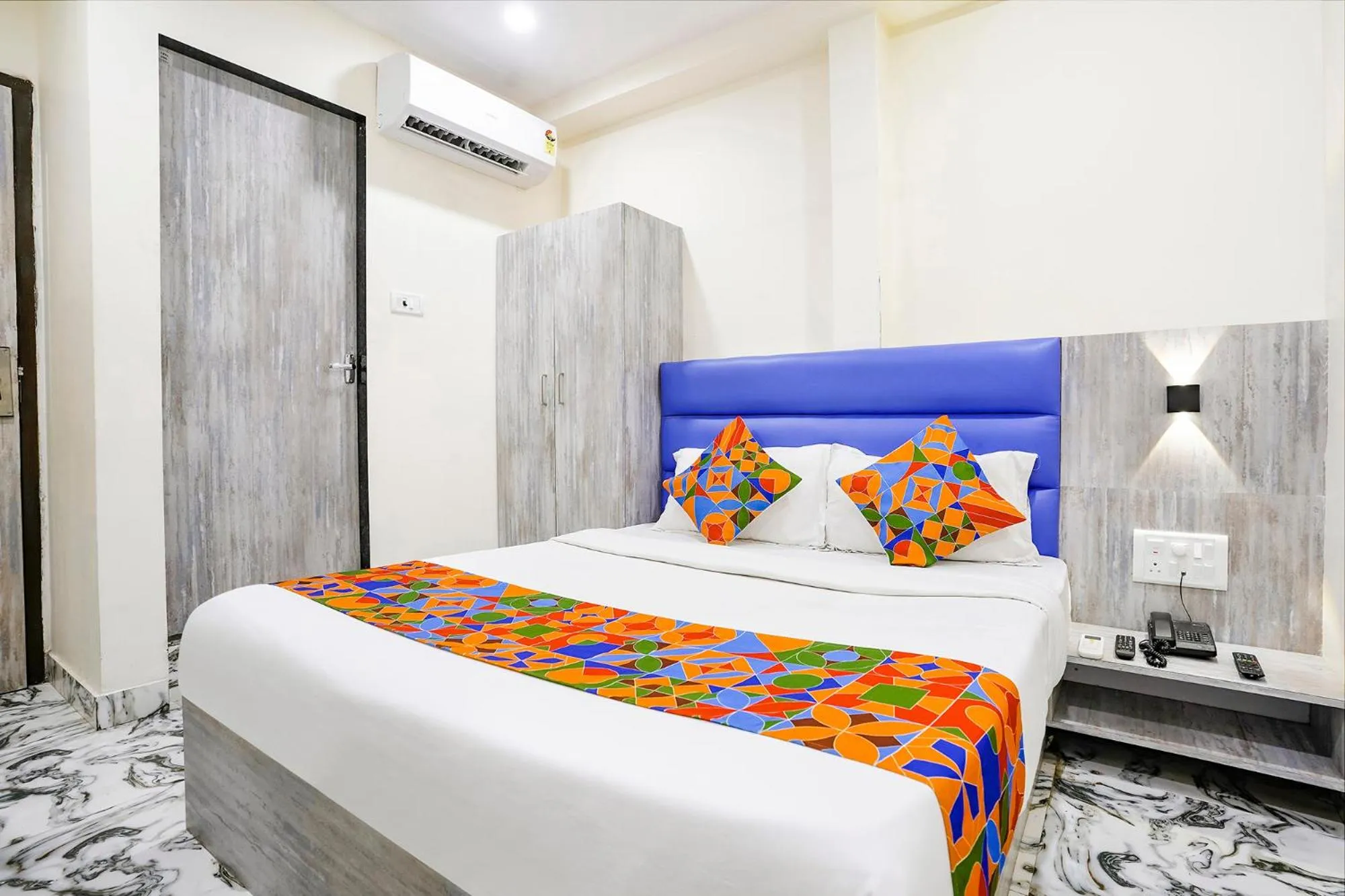 Bed in FabHotel Good Luck Residency