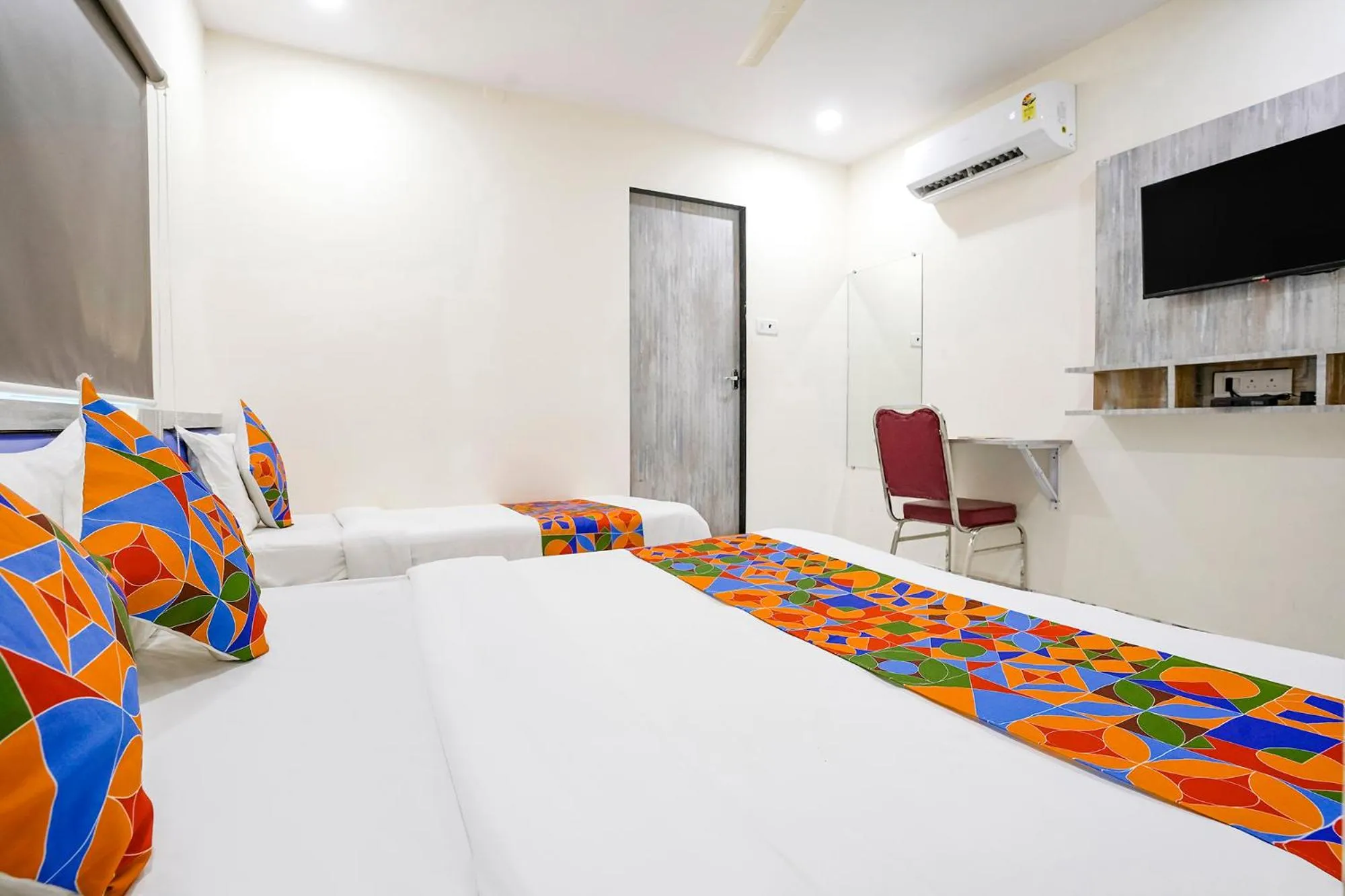 Bed in FabHotel Good Luck Residency