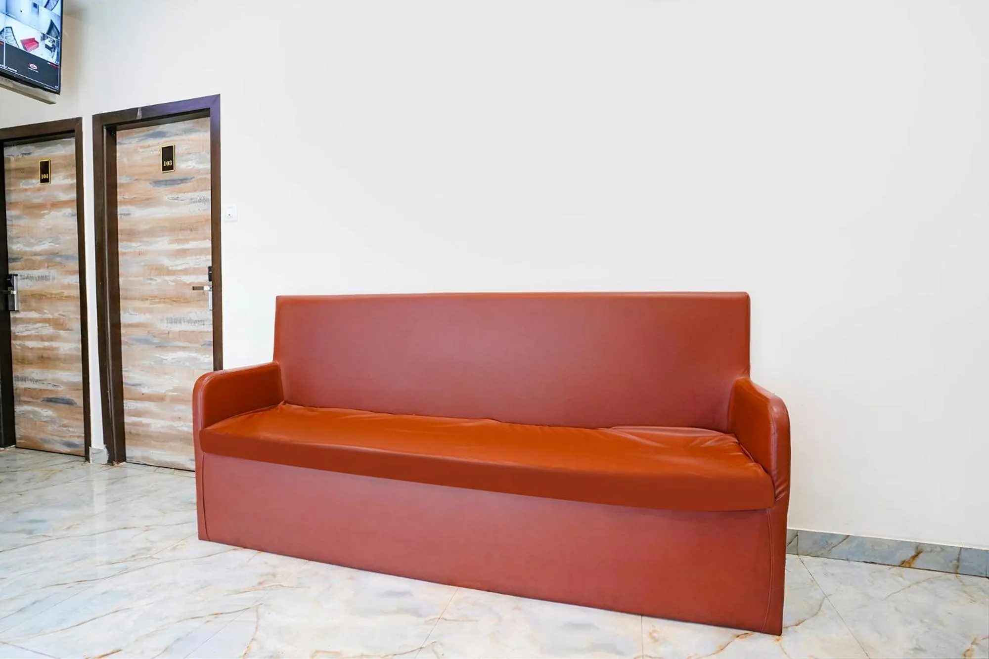 Seating area in FabHotel Good Luck Residency