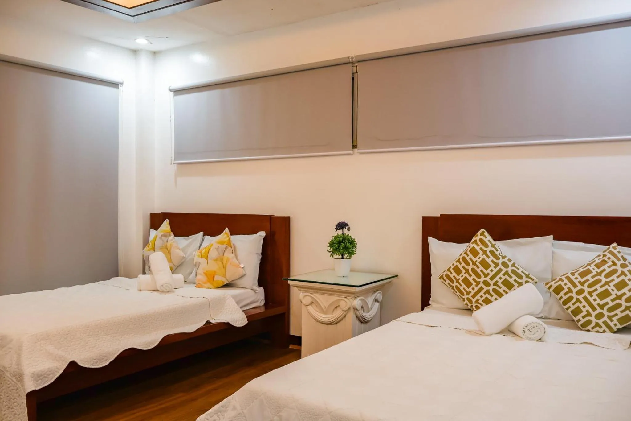 Bed in Teofely Gardens Resort near Tagaytay