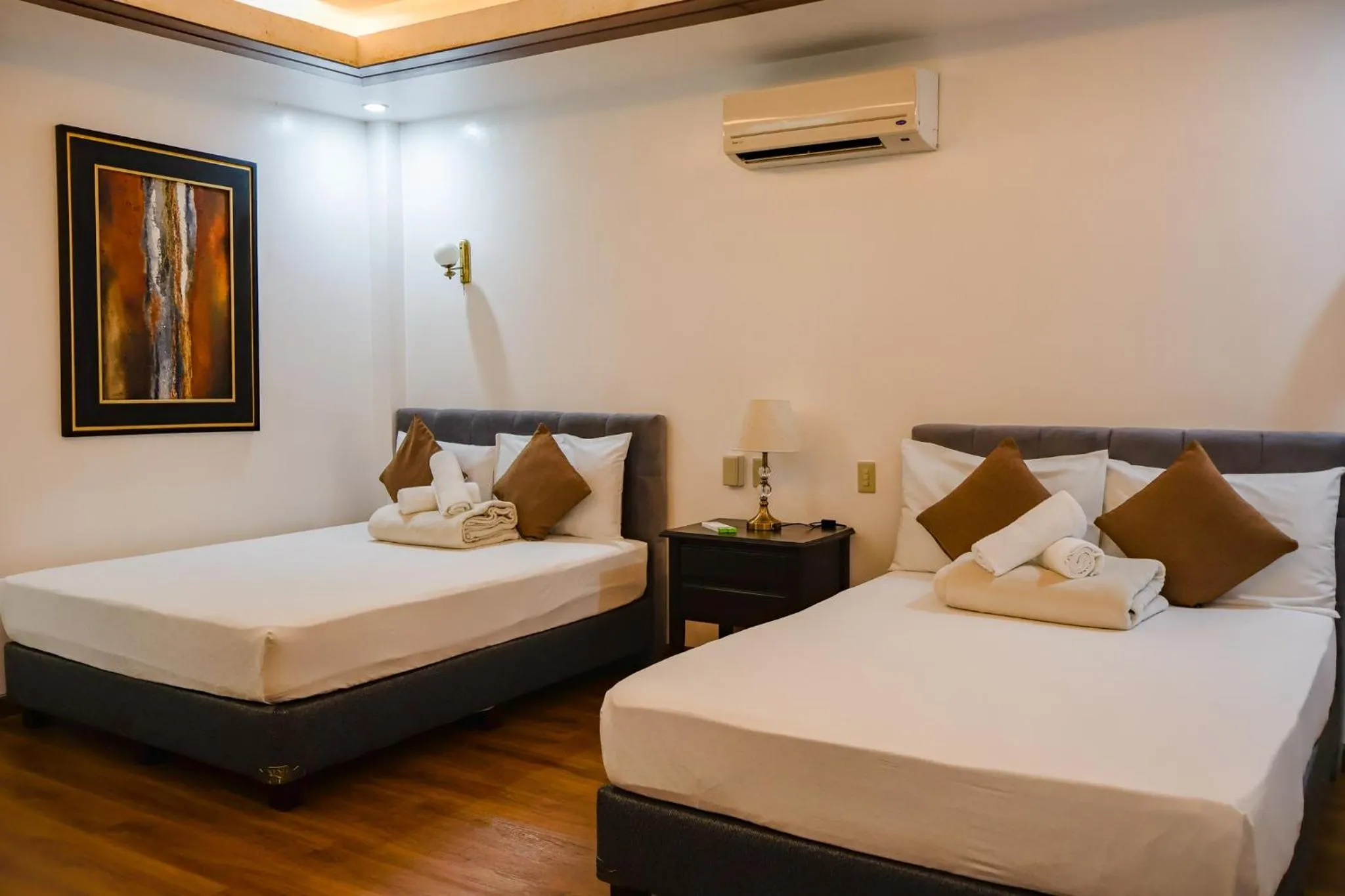 Bed in Teofely Gardens Resort near Tagaytay
