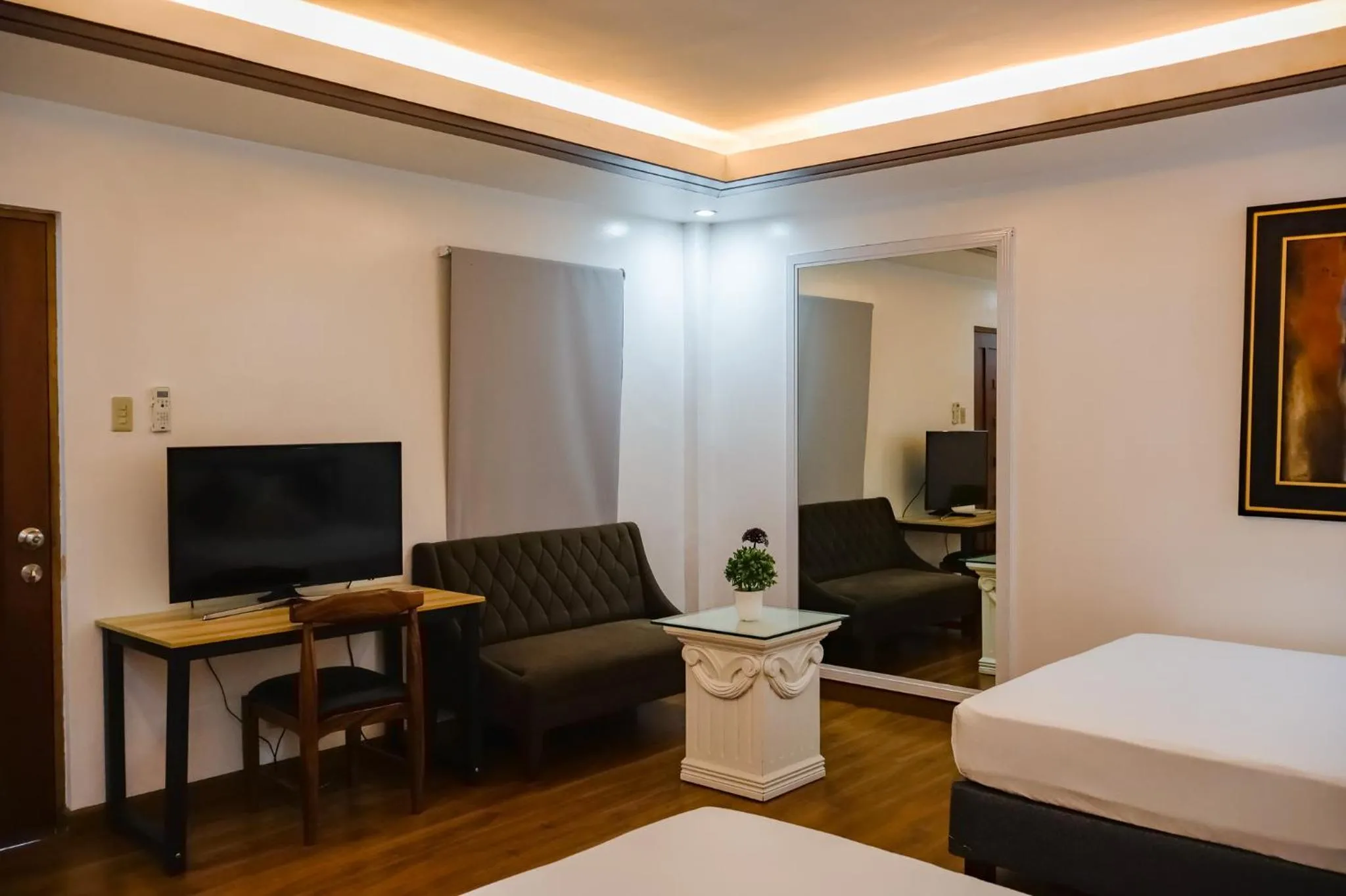 Bed in Teofely Gardens Resort near Tagaytay