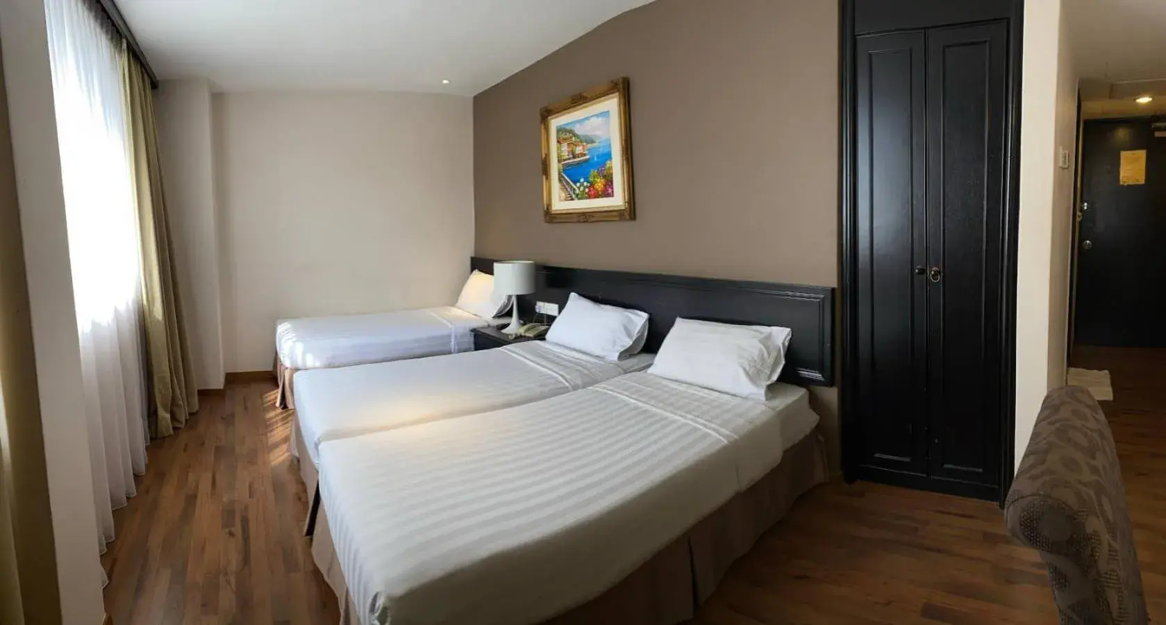 Bed in PJ De Inn Hotel Bed in PJ De Inn Hotel