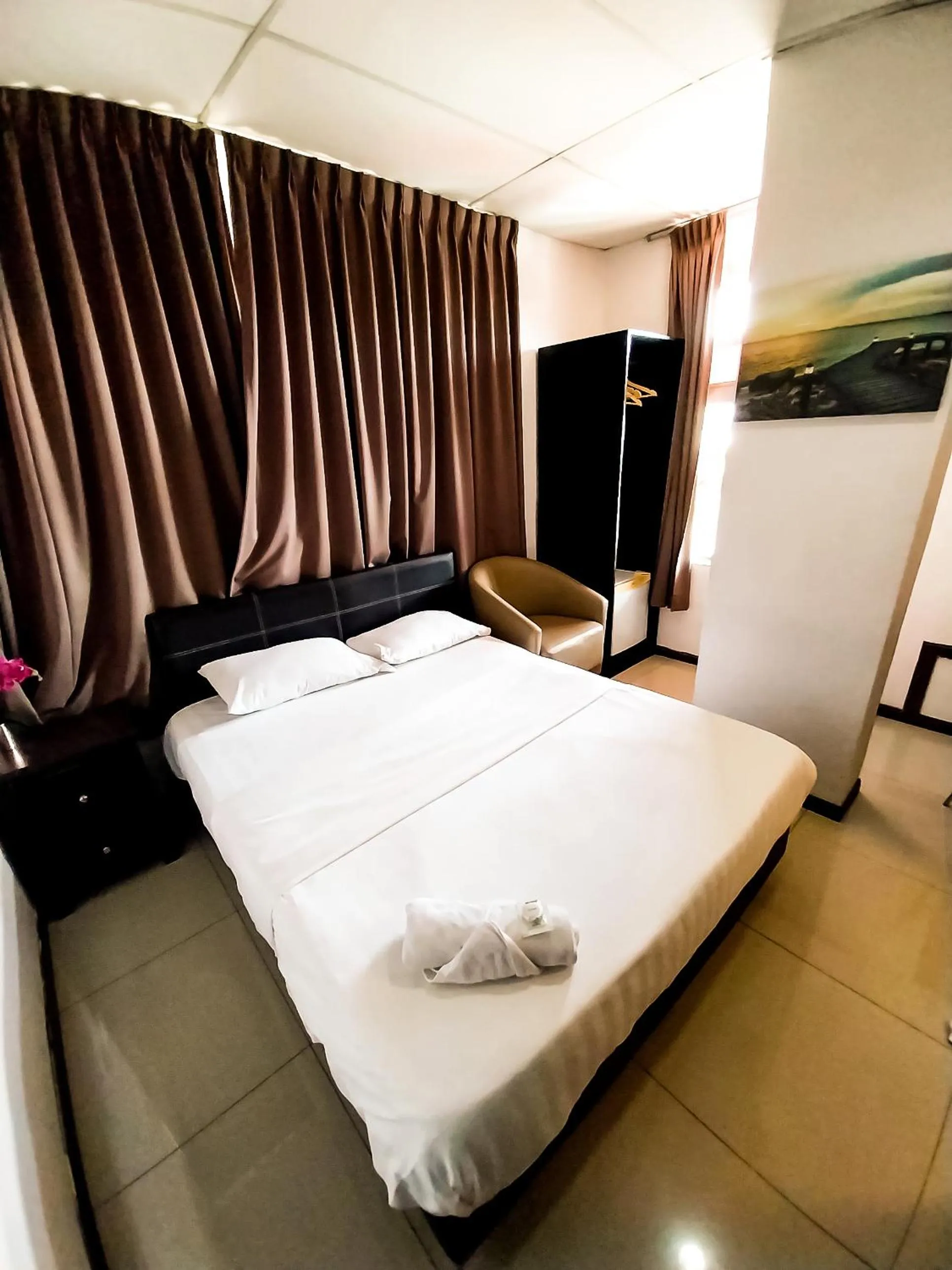 Bedroom in MB Budget Hotel