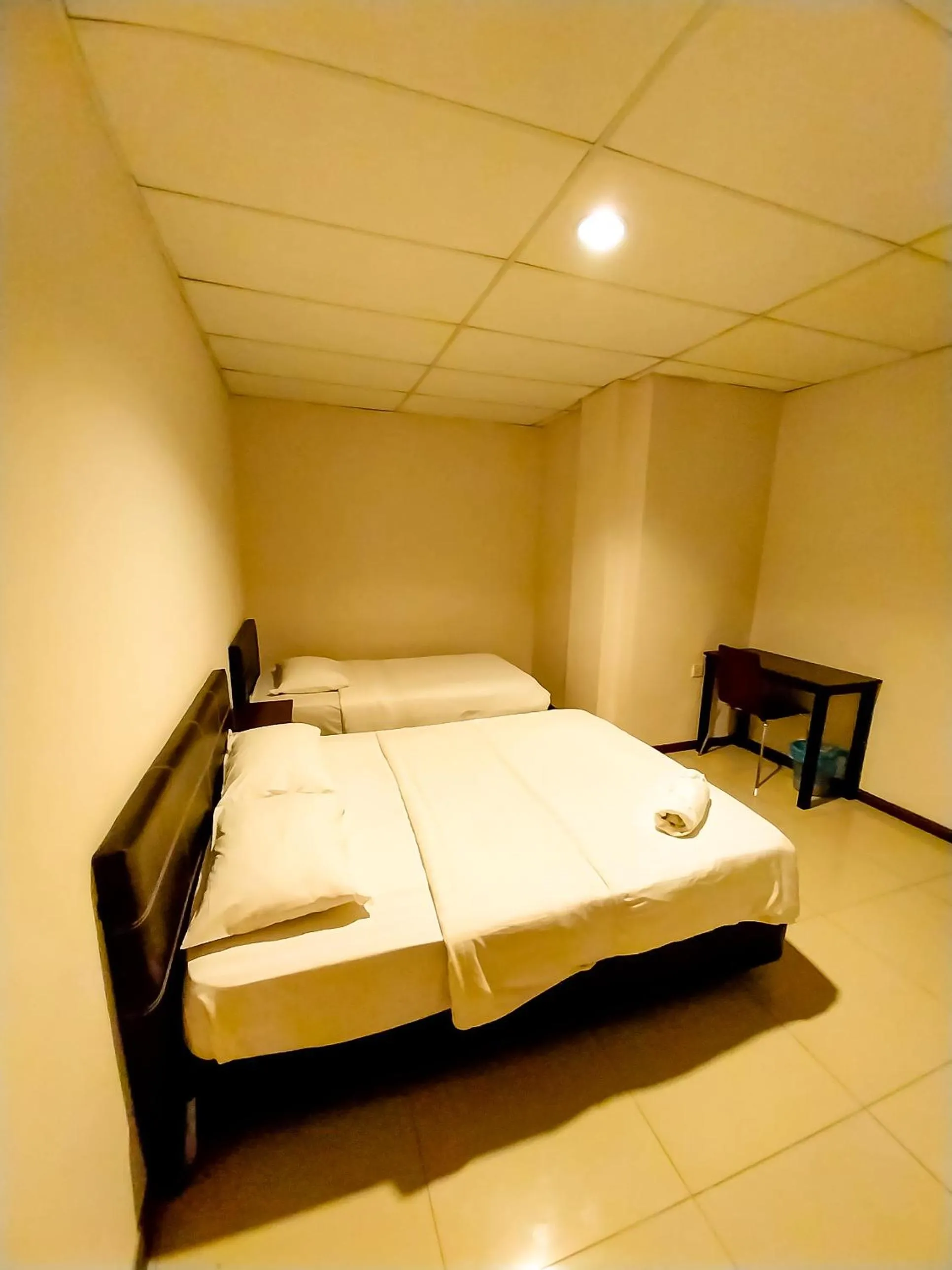 Bedroom in MB Budget Hotel