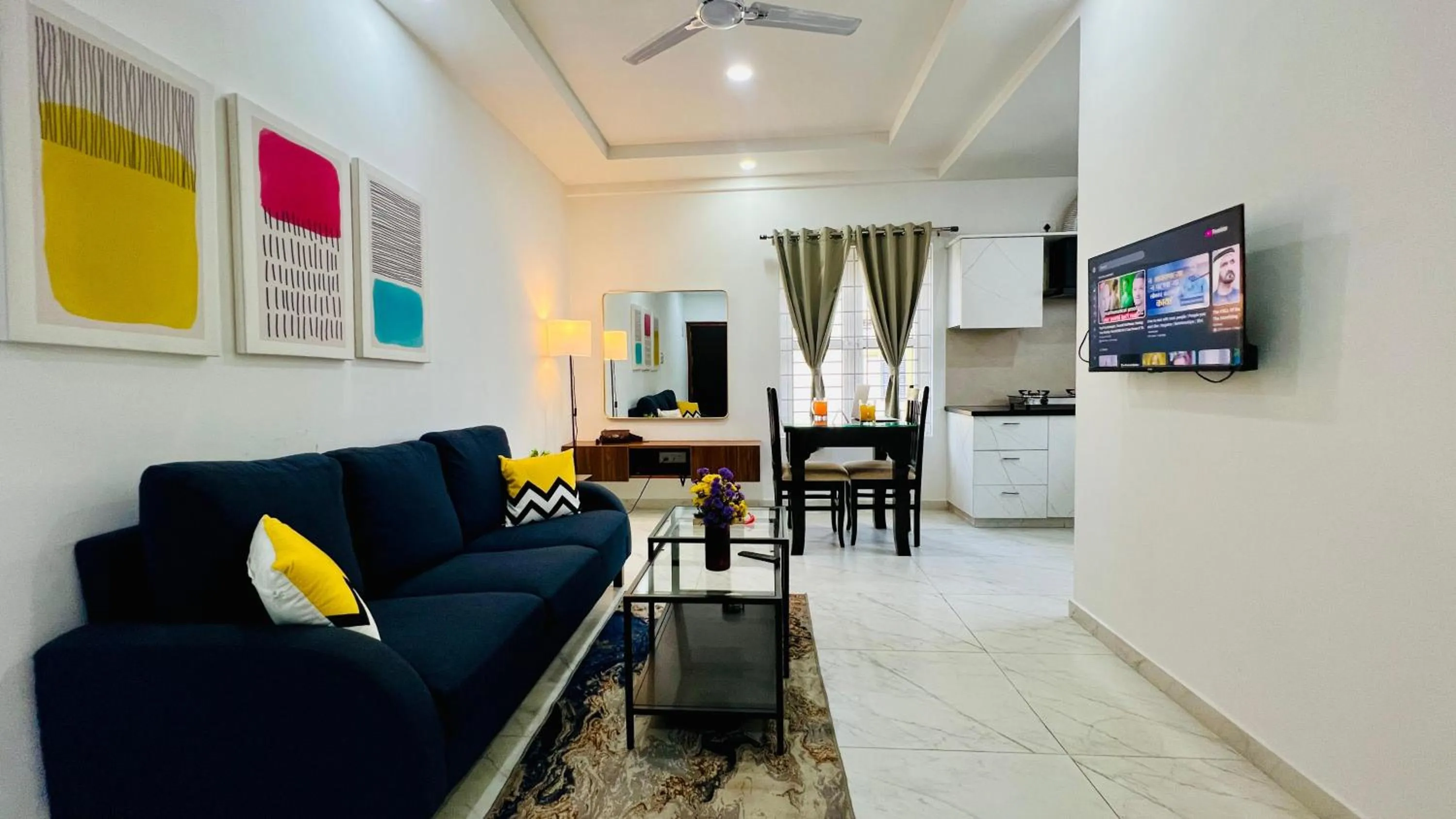 Communal lounge/ TV room in Olive Serviced Apartments BTM Layout