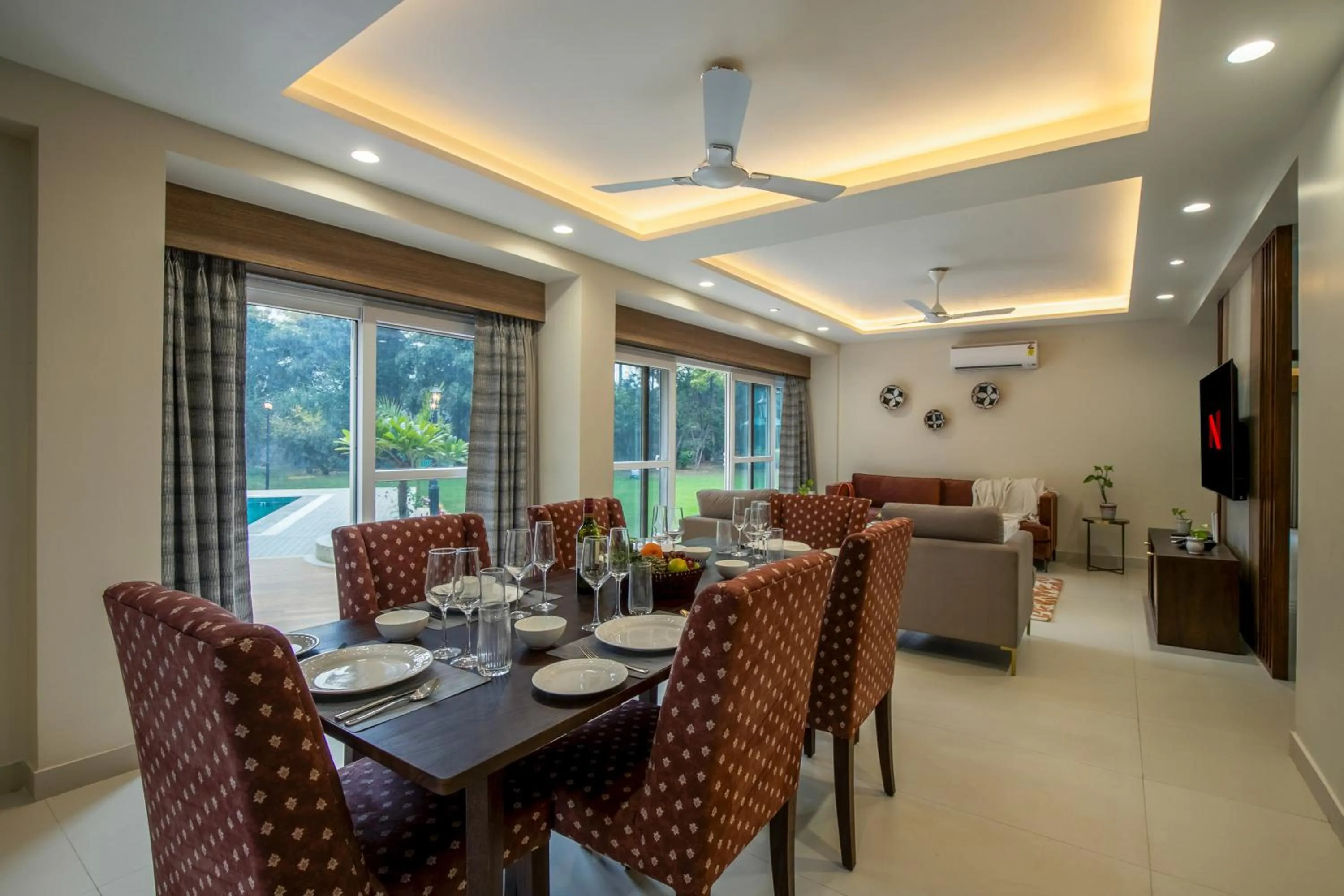 Living room in ELIVAAS 6 BHK Farmstay with Pvt Pool & Garden - Esh