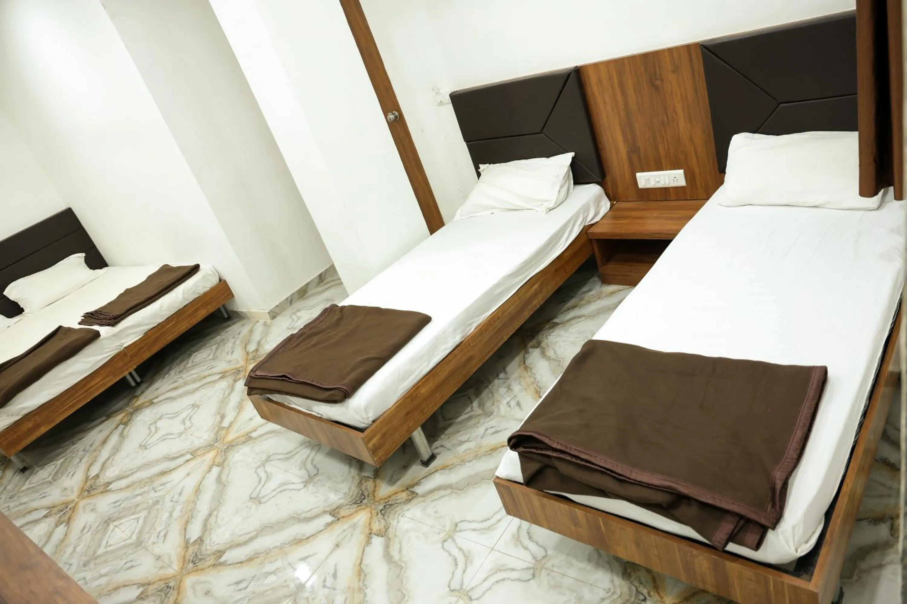 Bed in Hotel Aaram Kalupur