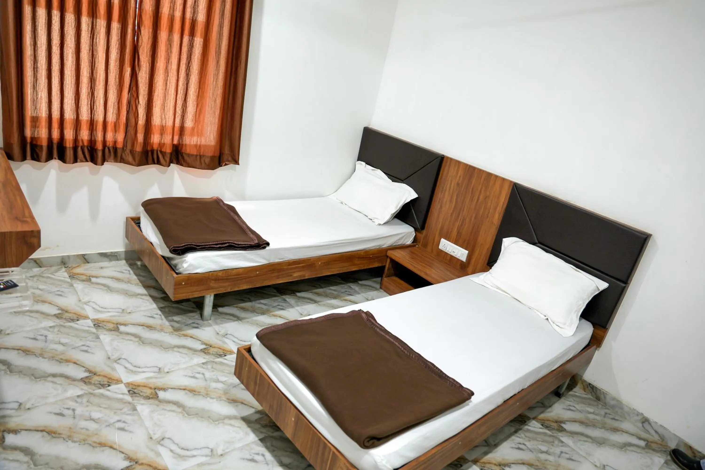 Bed in Hotel Aaram Kalupur