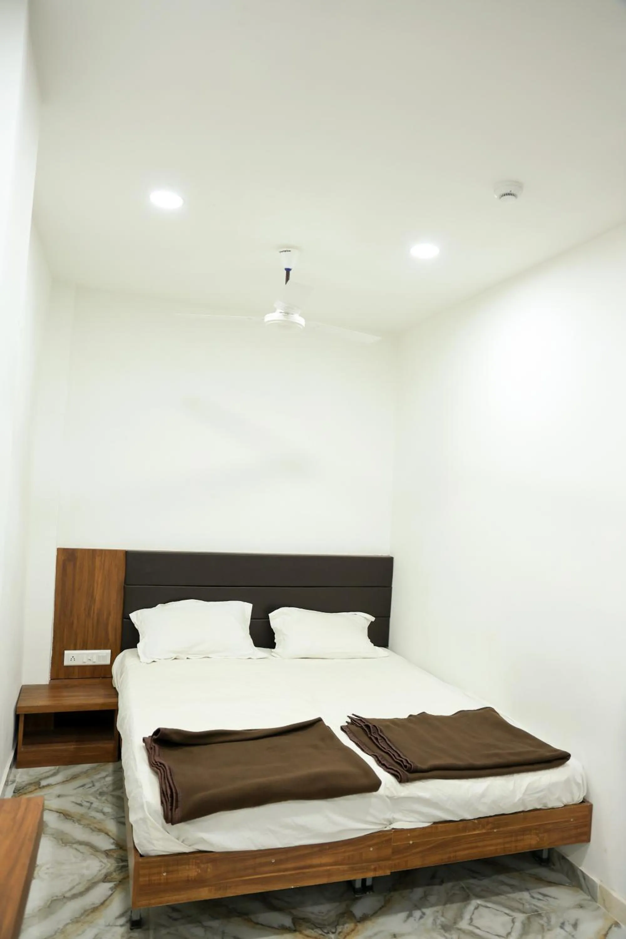 Bed in Hotel Aaram Kalupur