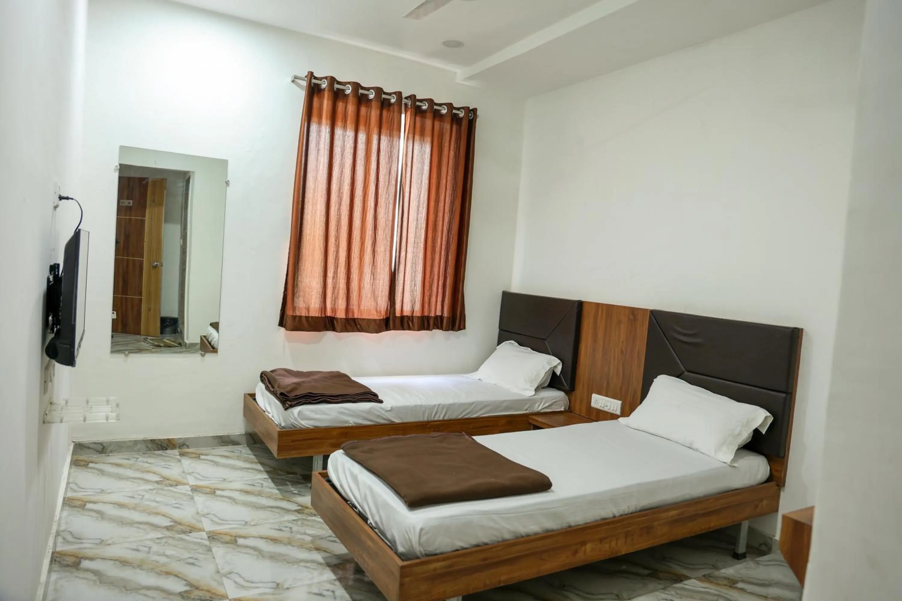 Bed in Hotel Aaram Kalupur