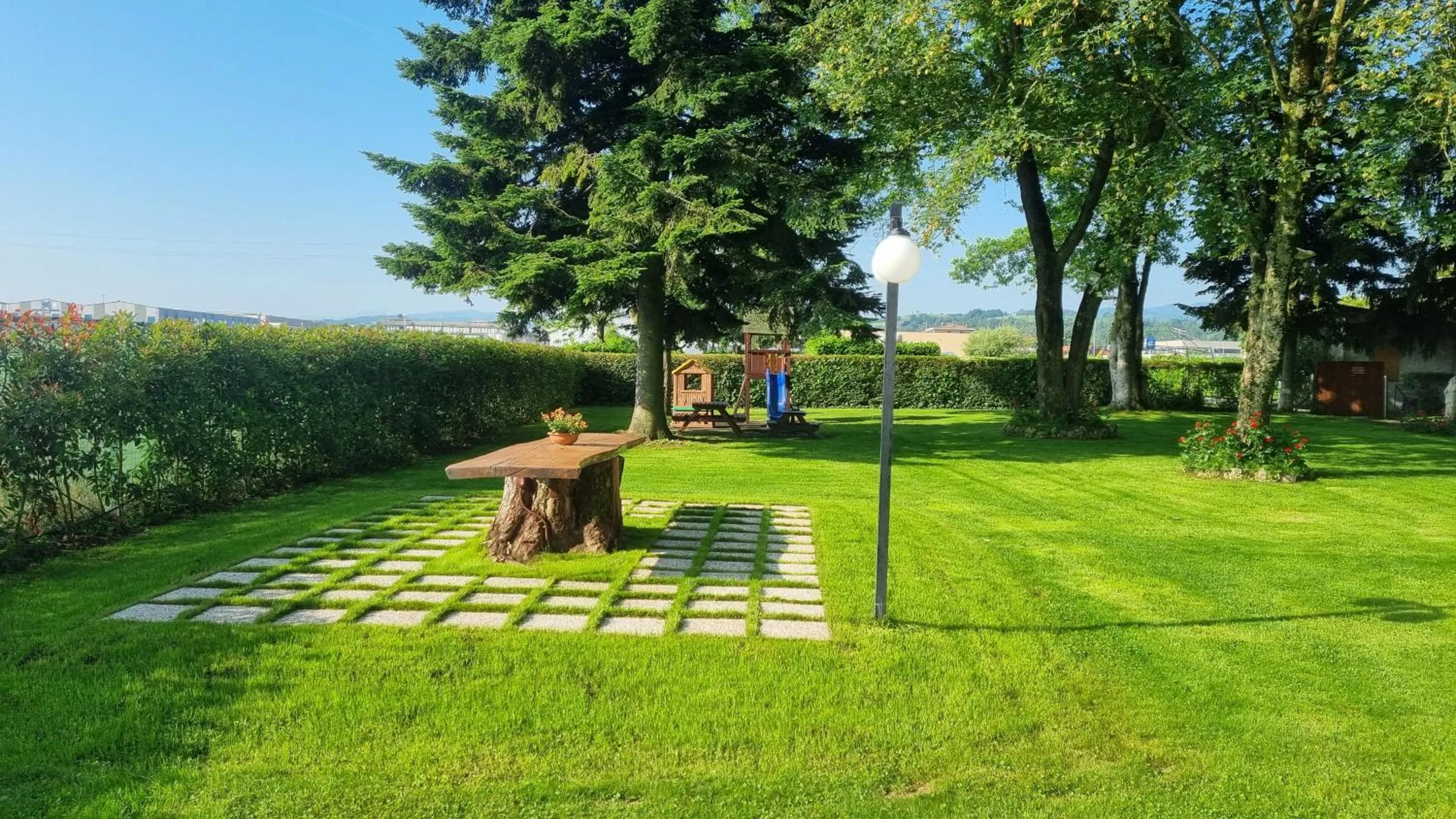 Garden view in HOTEL AI TIGLI