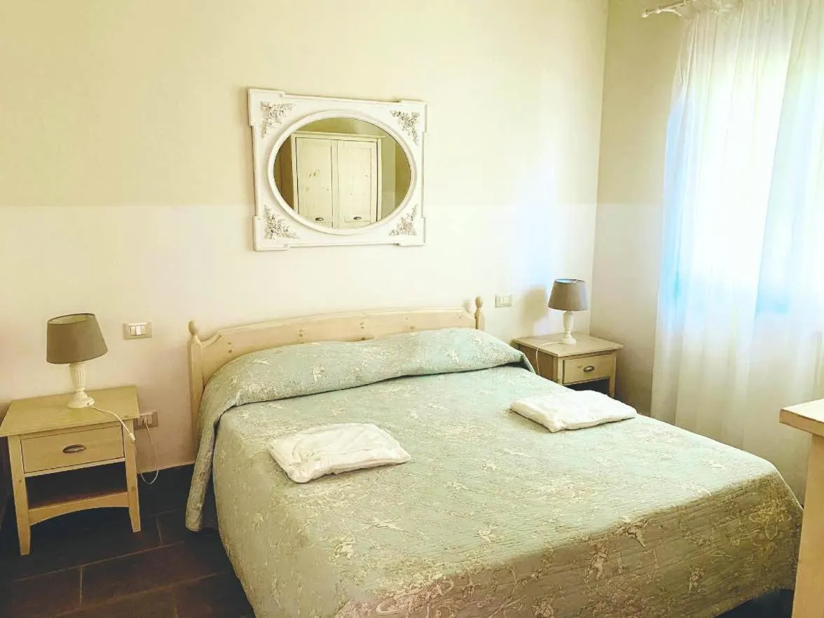 Bed in Relais Le Fornacelle