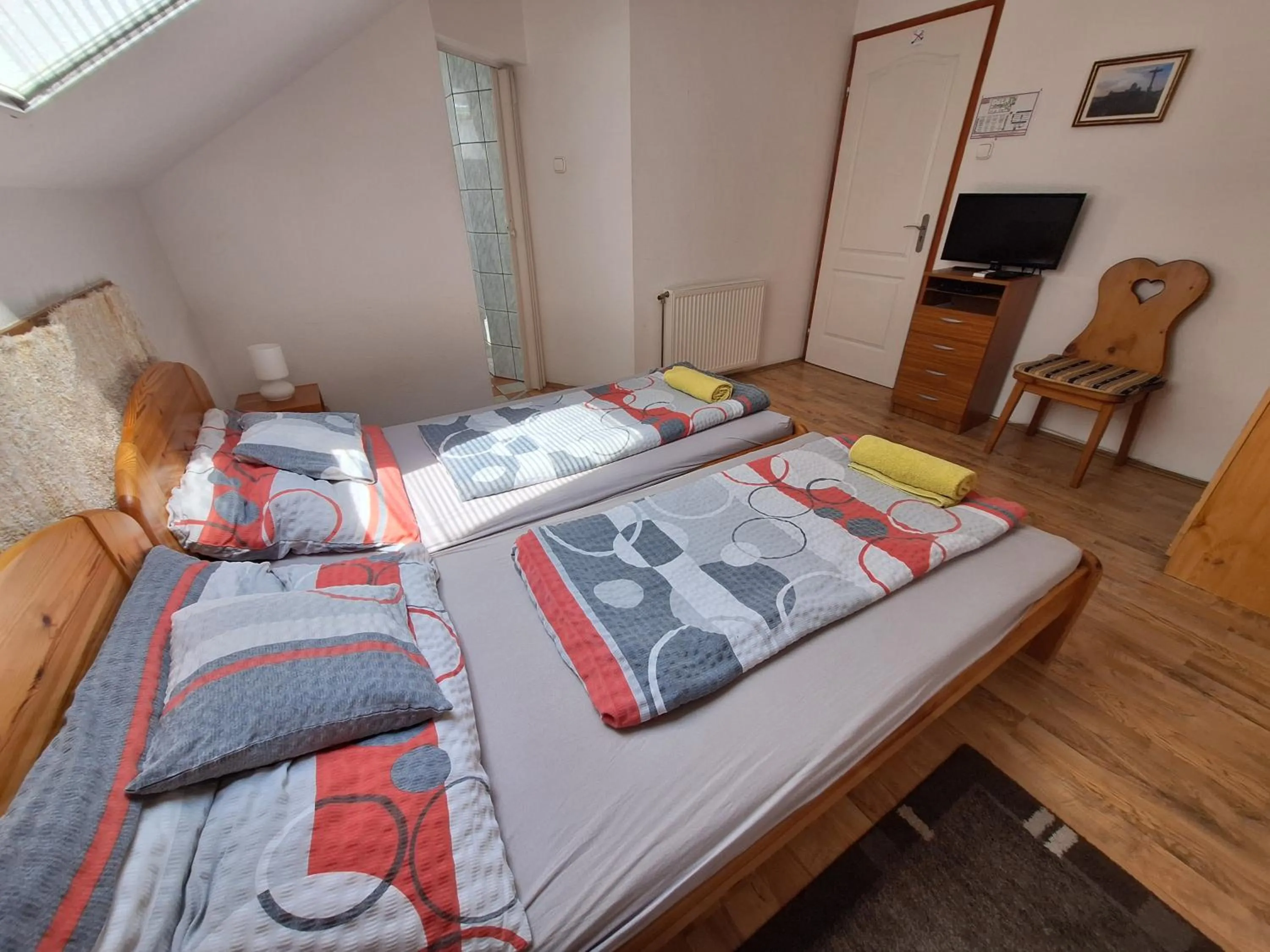 Bed in Lila Akác Vendégház Esztergom