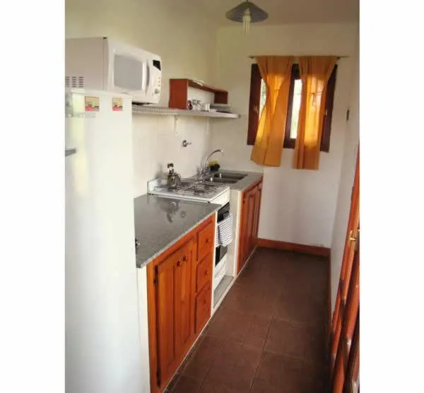 Kitchen or kitchenette in Cabañas Oma Lissi