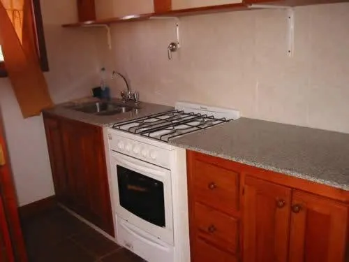 Kitchen or kitchenette in Cabañas Oma Lissi