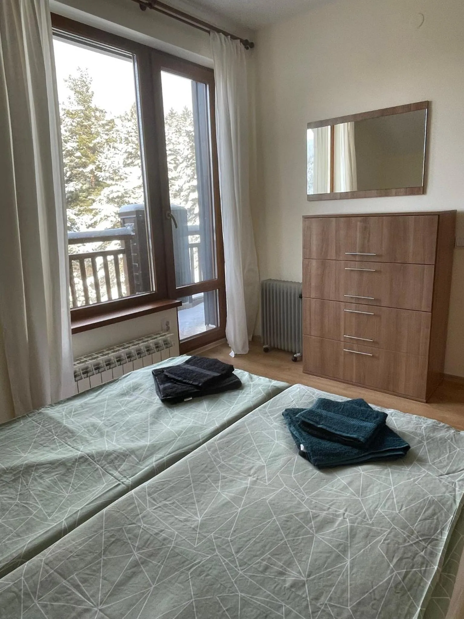 Bed in Cozy Mountain Apartment