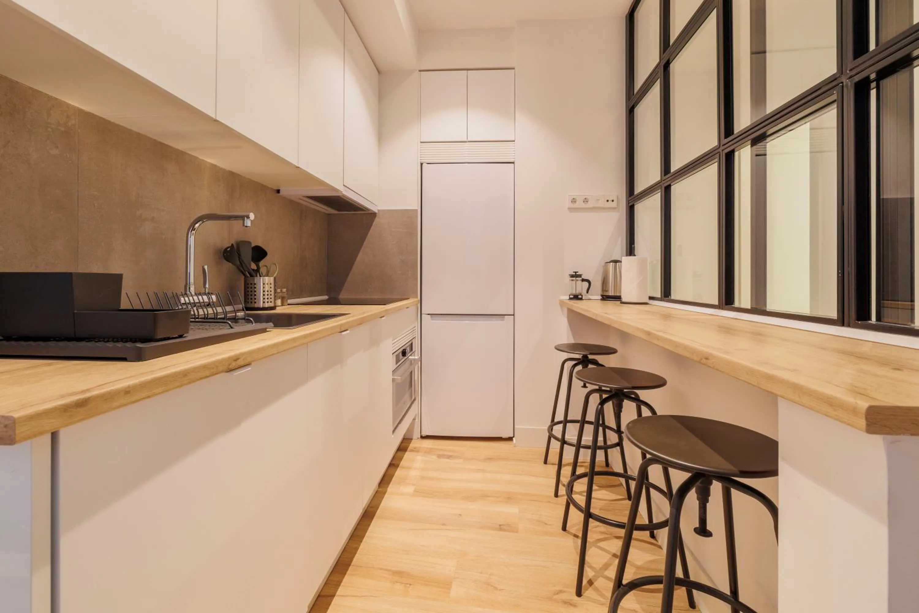 Kitchen or kitchenette in Fomento by Wynwood House