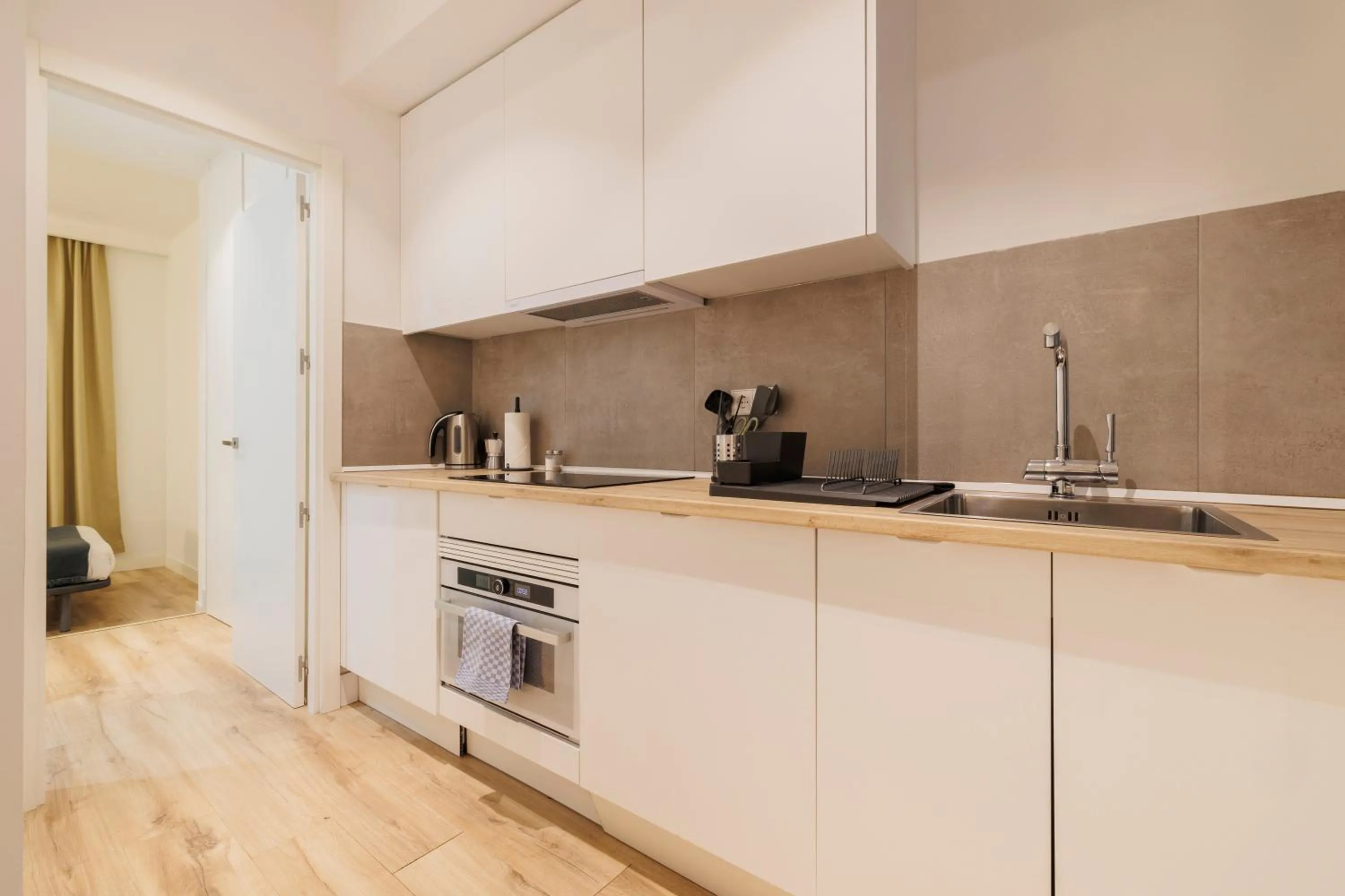 Kitchen or kitchenette in Fomento by Wynwood House