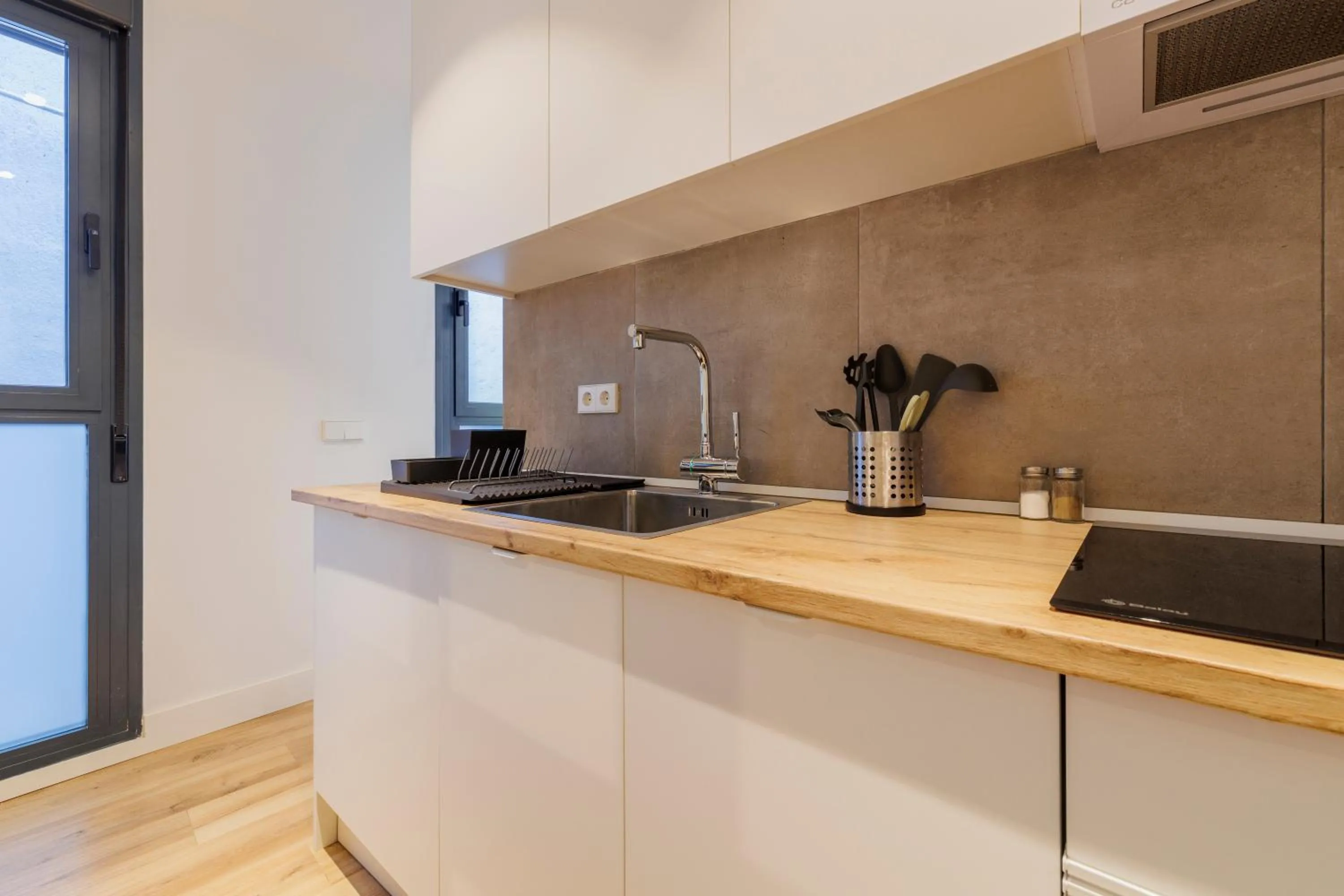 Kitchen or kitchenette in Fomento by Wynwood House