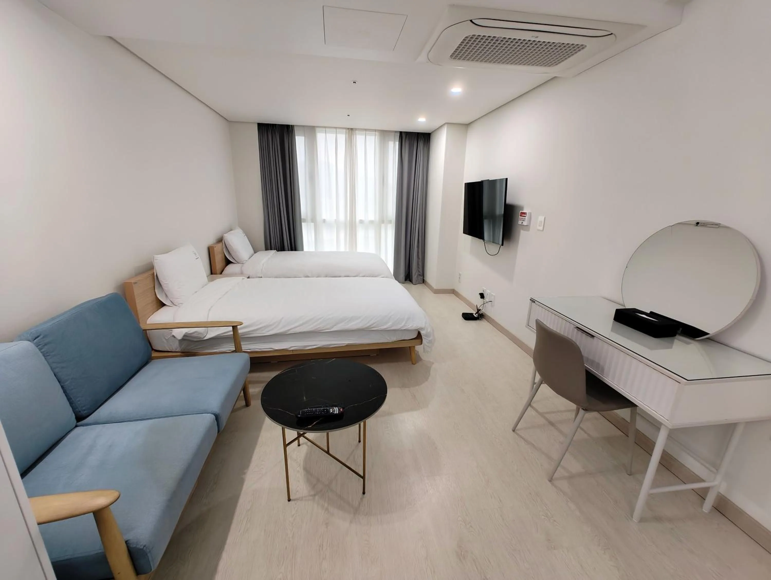 Bed in W Residence Hotel Centum City