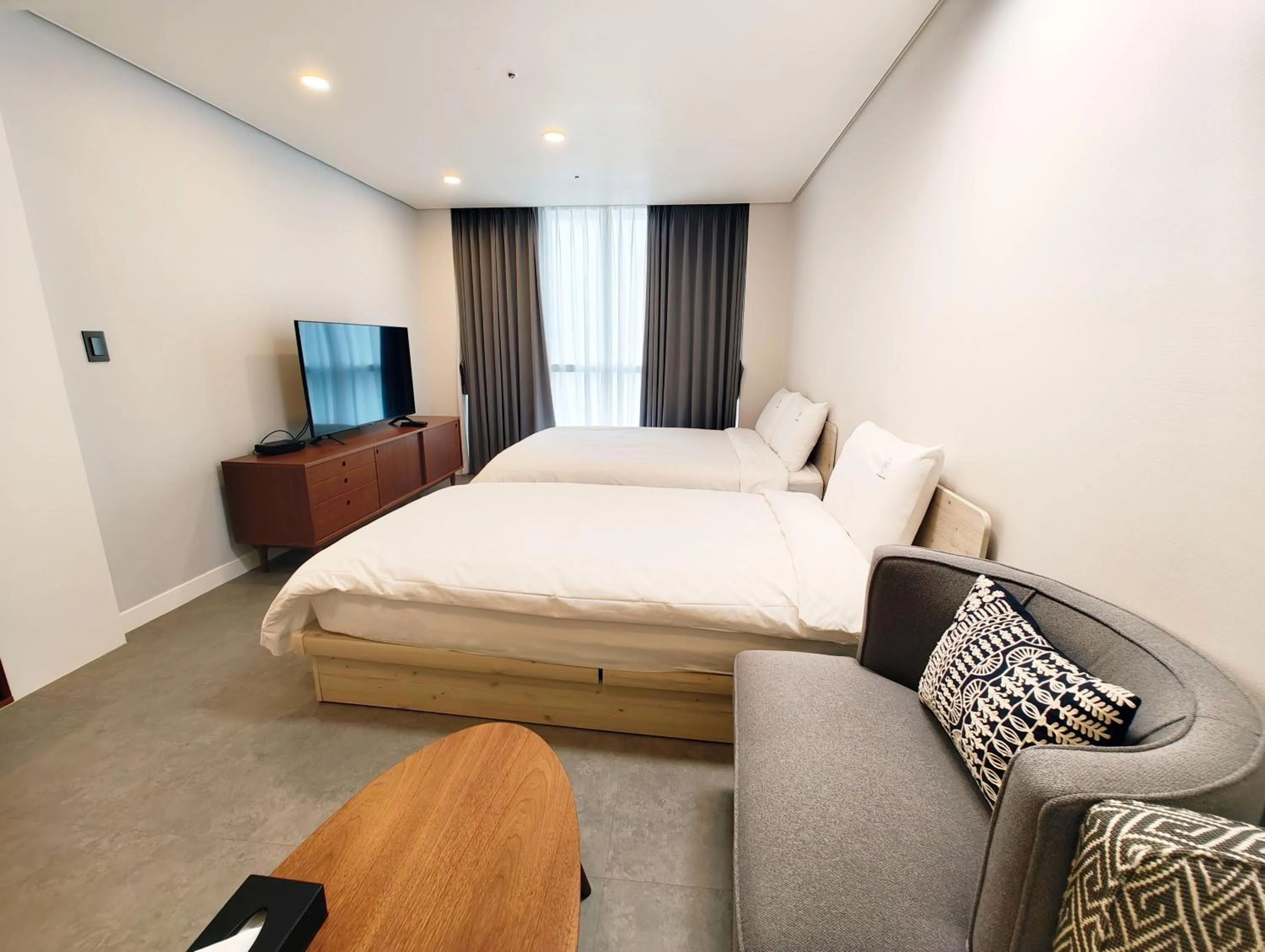 Bed in W Residence Hotel Centum City