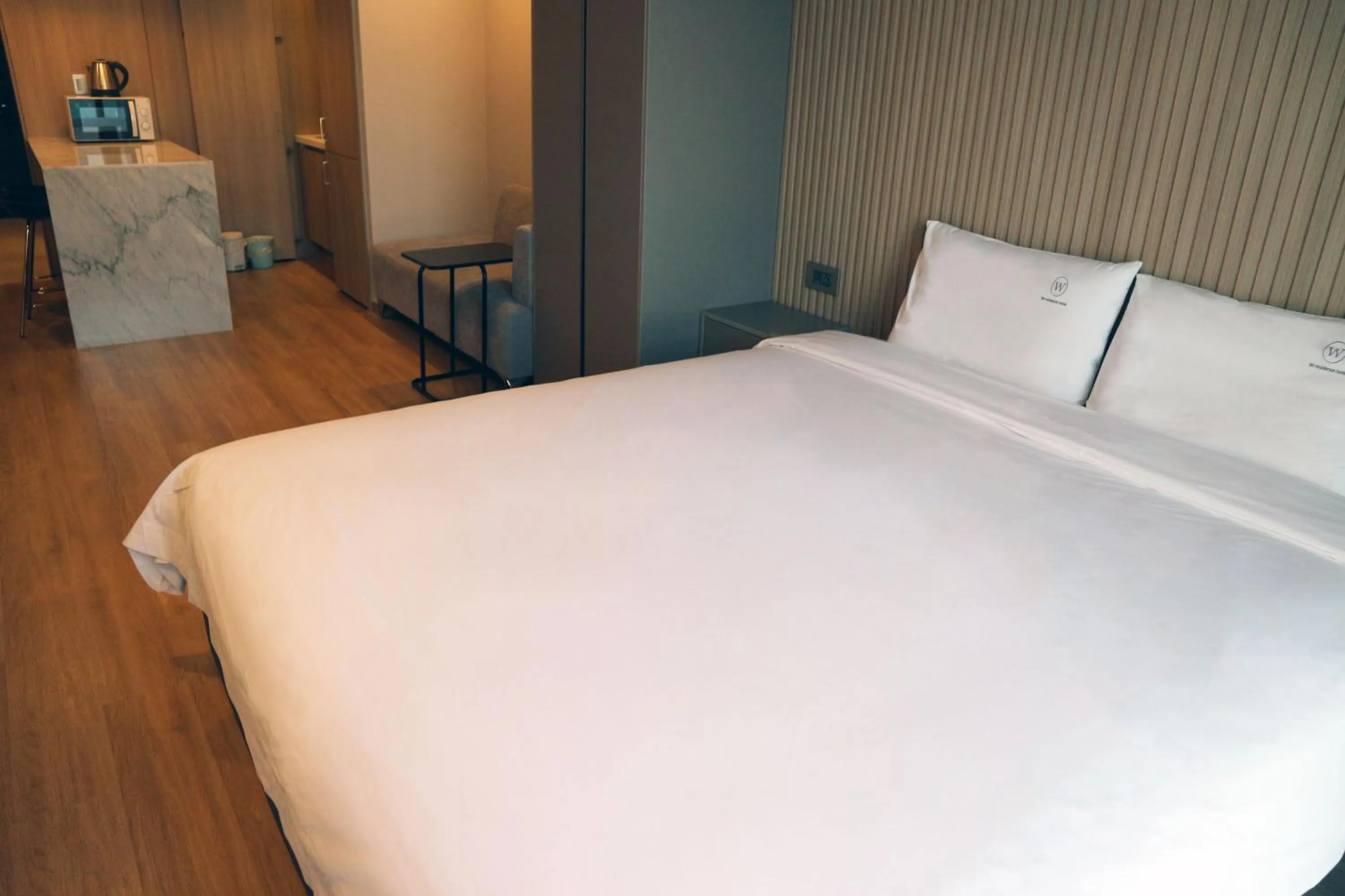 Bed in W Residence Hotel Centum City