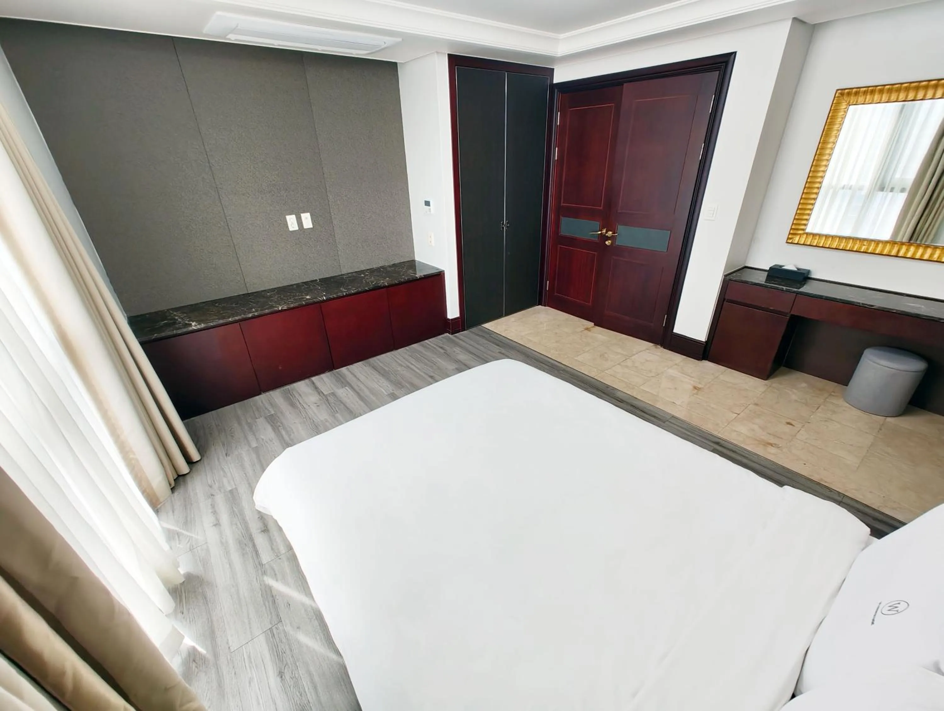 Bed in W Residence Hotel Centum City