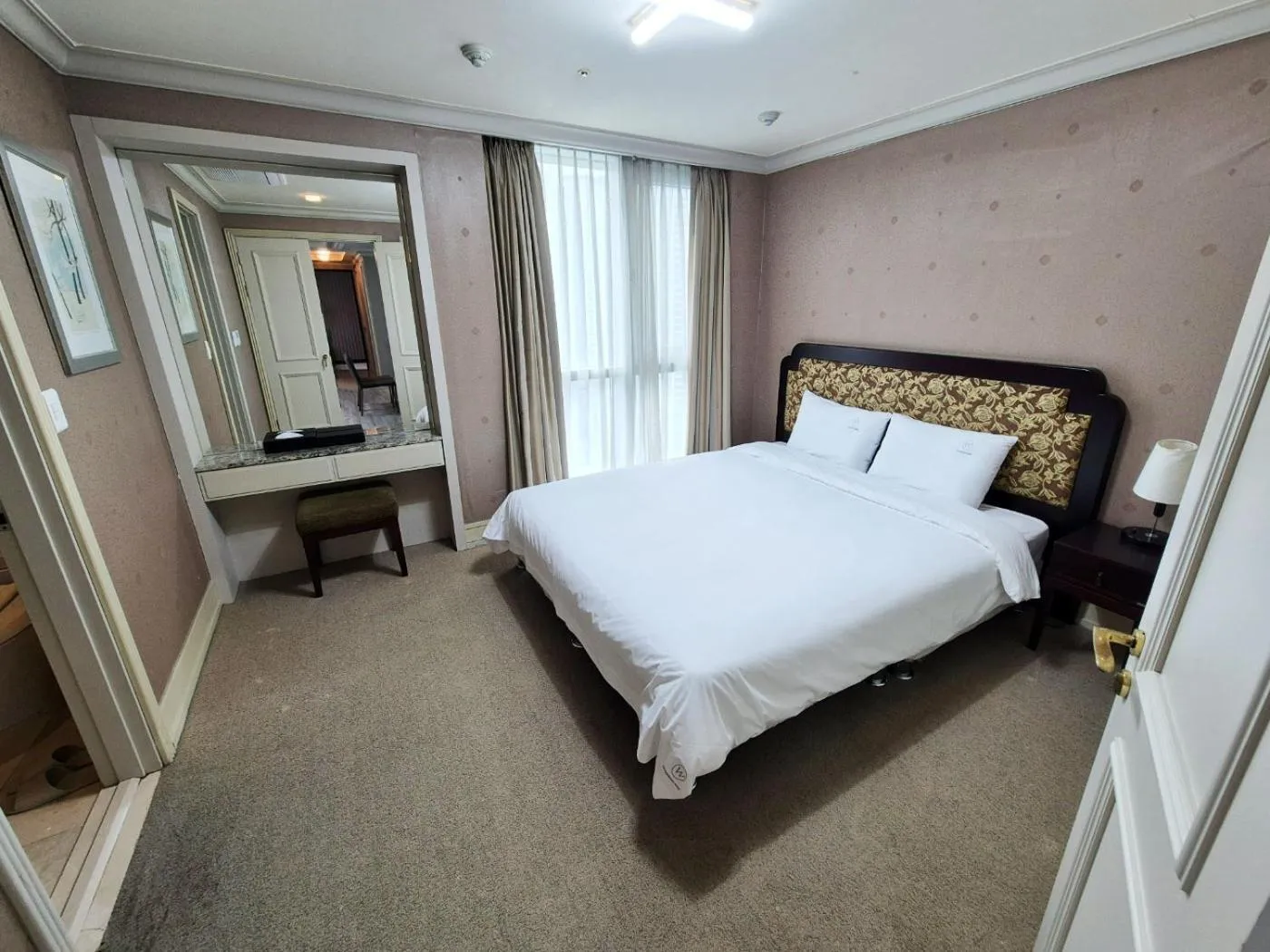 Bed in W Residence Hotel Centum City