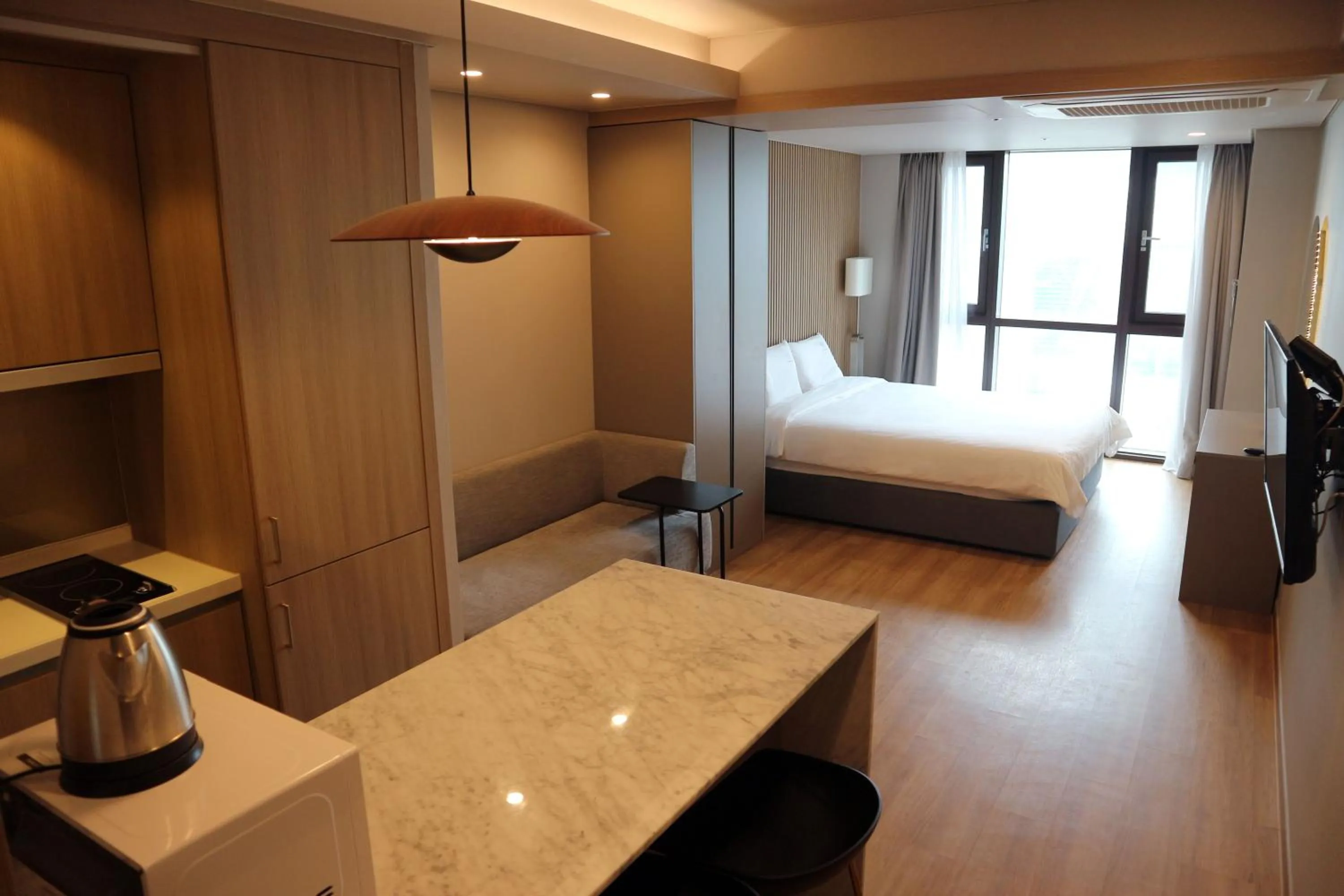 Bed in W Residence Hotel Centum City