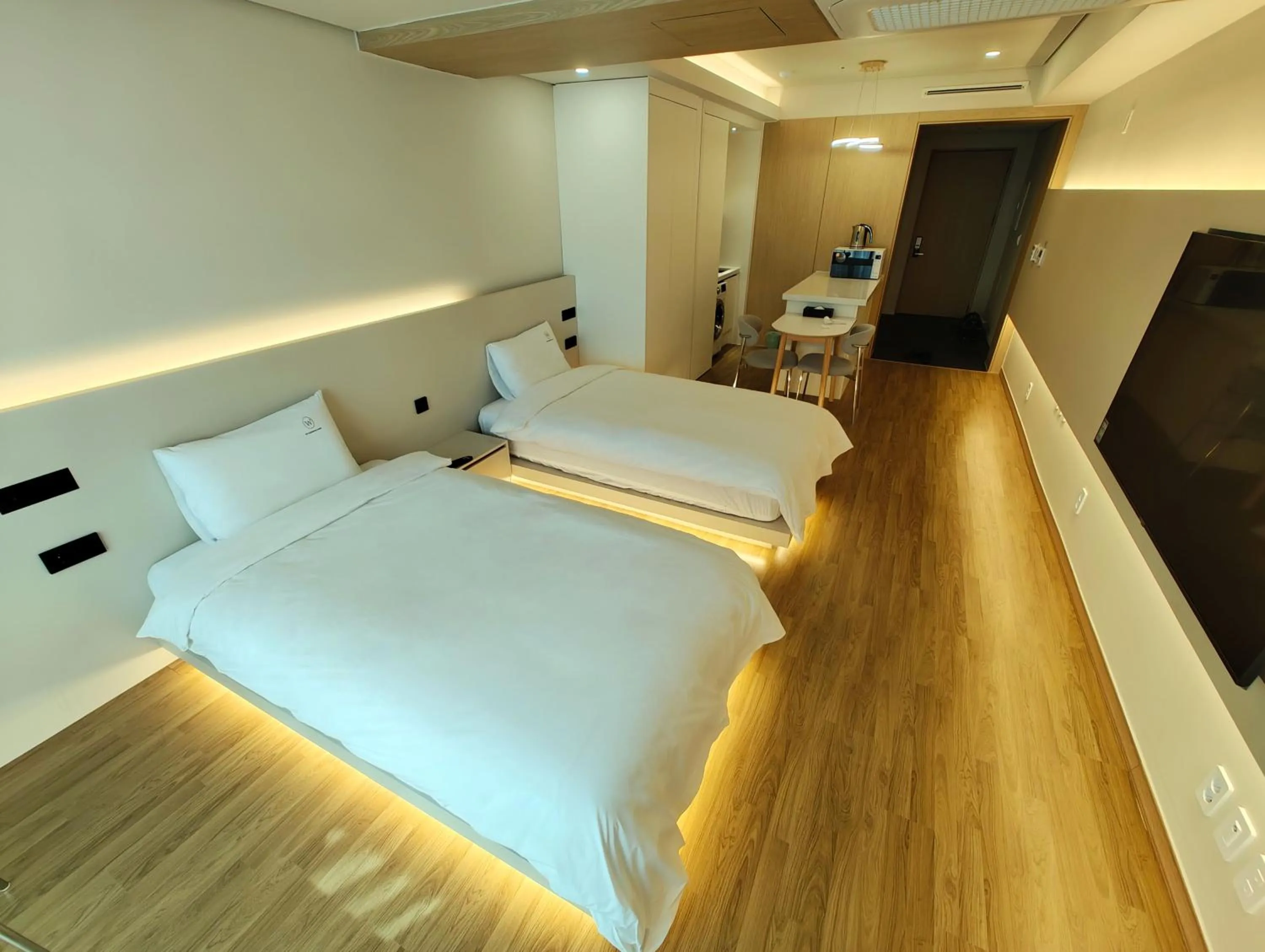 Bed in W Residence Hotel Centum City