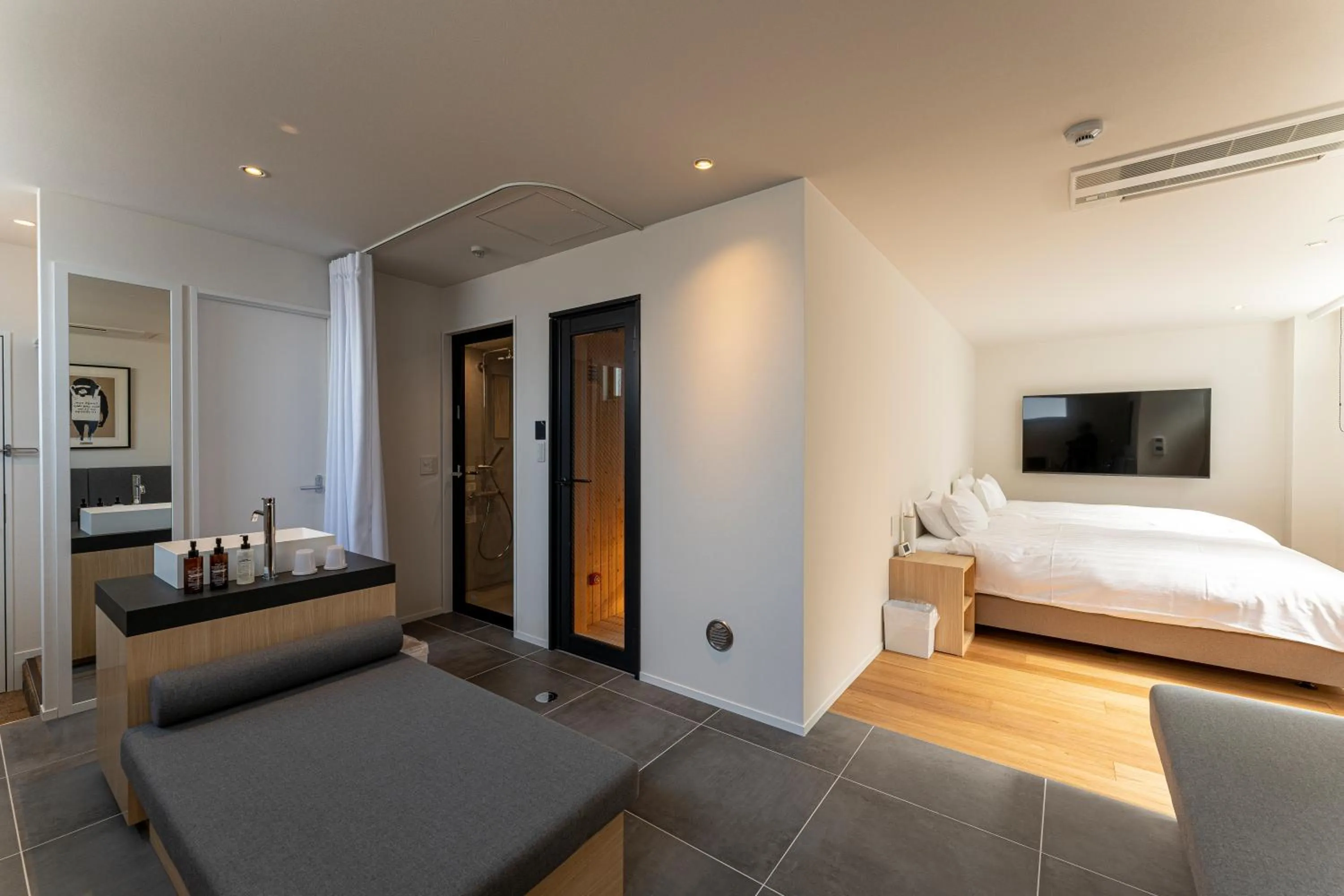 Living room, Bed in 9HOTEL Tenjin