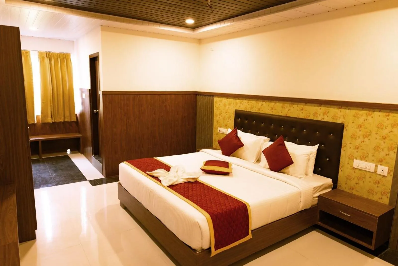 Bed in HOTEL GRAND ORCHID