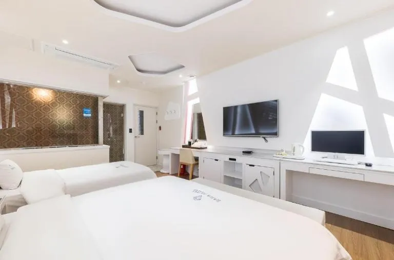 Bed in Zara Hotel Peace Square