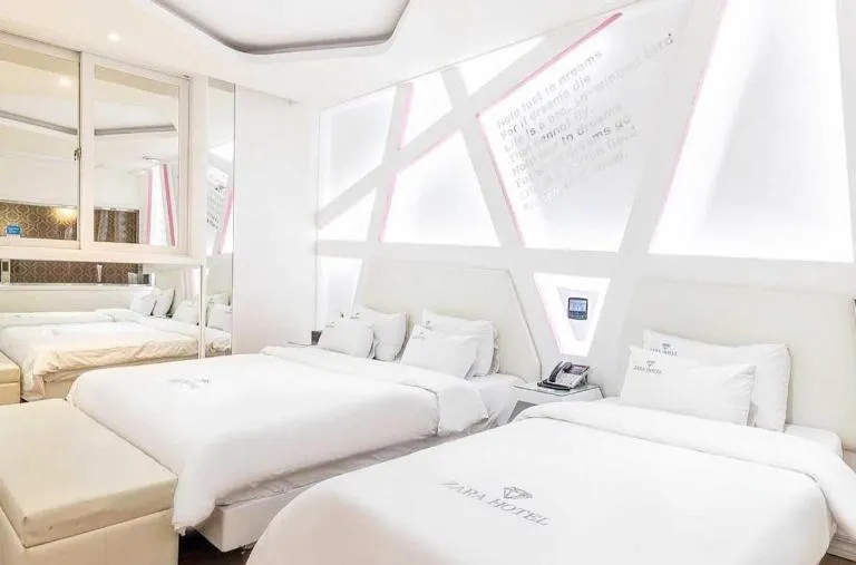 Bed in Zara Hotel Peace Square