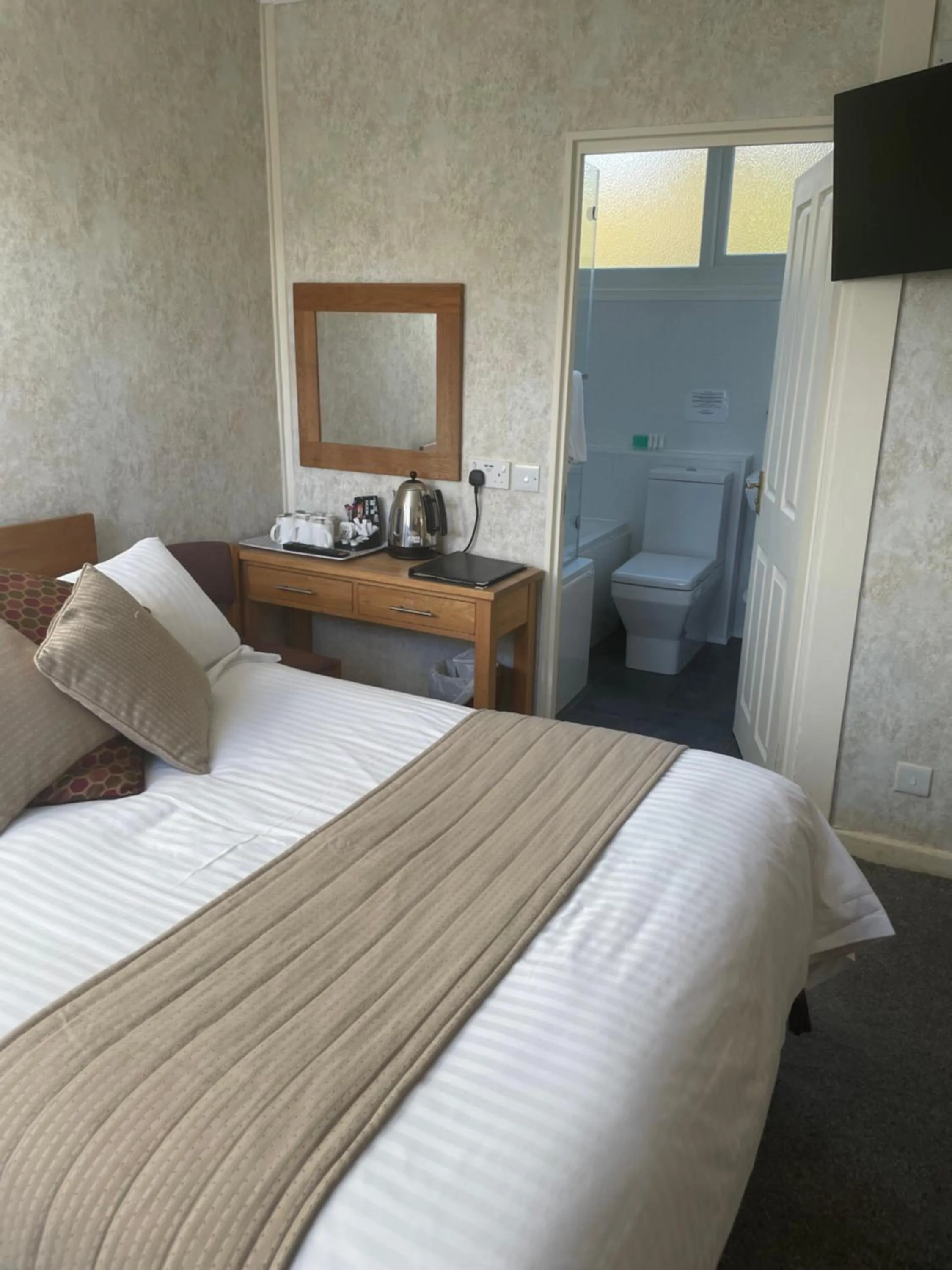 Bed in The Dog & Partridge Country Inn